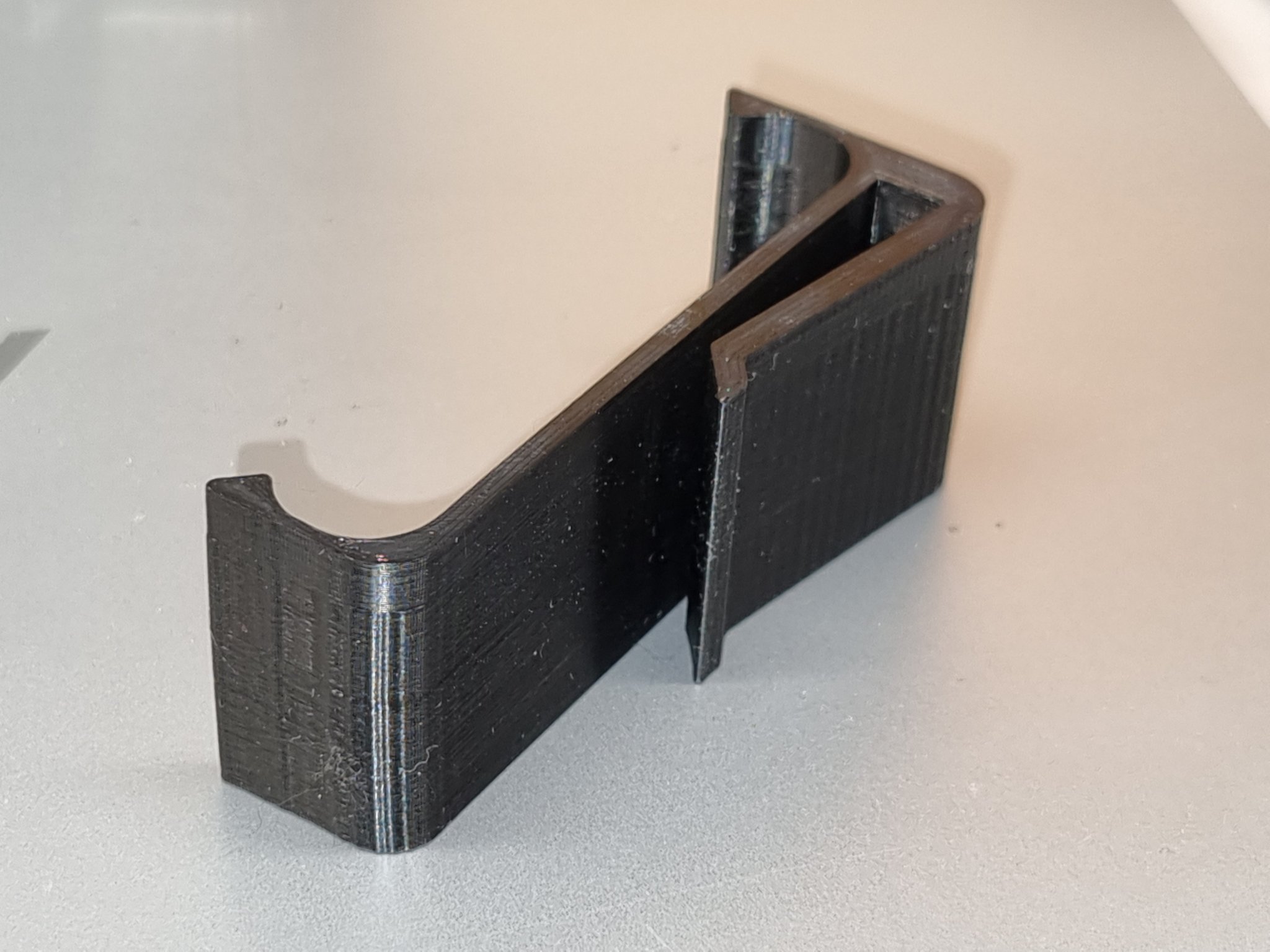 Giá đỡ pin ngoài cho máy quay cầm tay nhỏ