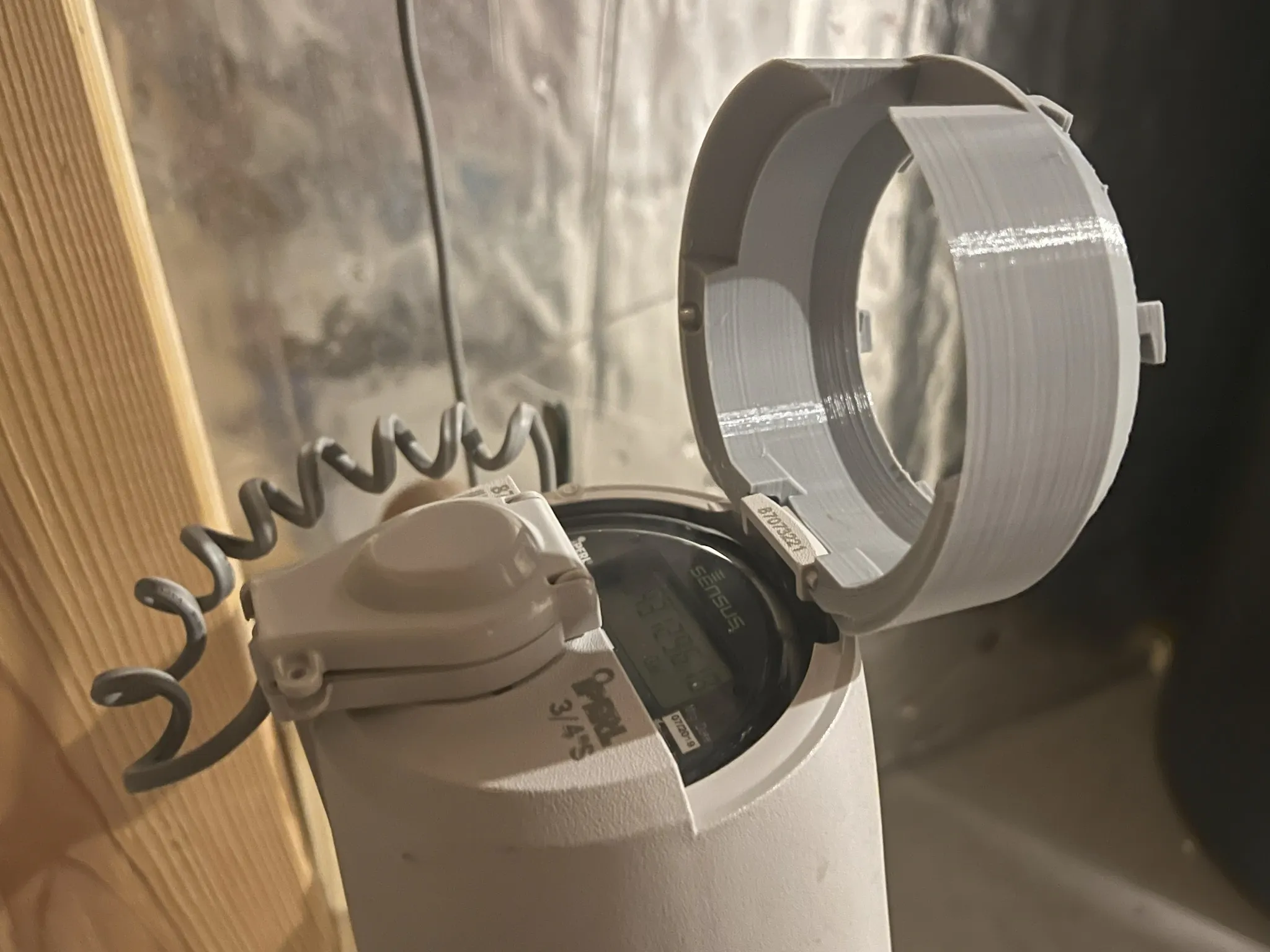 Bộ chuyển đổi đồng hồ nước Sensus iPerl cho AI-on-the-edge của jomjol