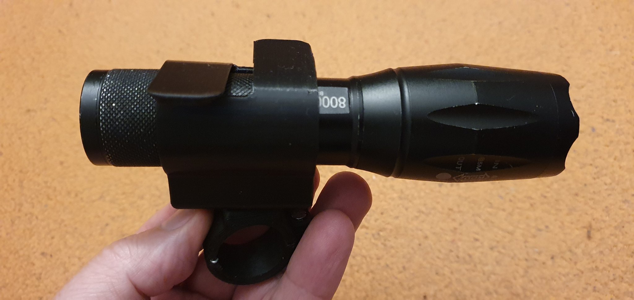 Giá đỡ đèn pin cho tay lái xe đạp