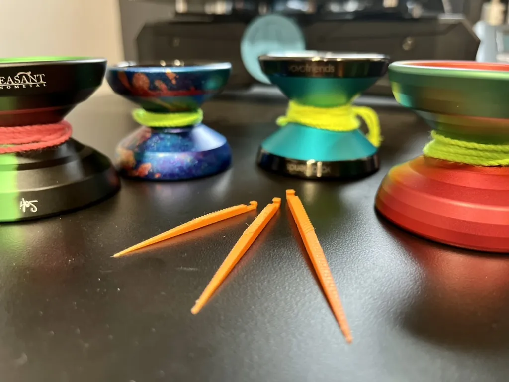 Dụng cụ gỡ rối dây yo-yo hình móc đơn giản