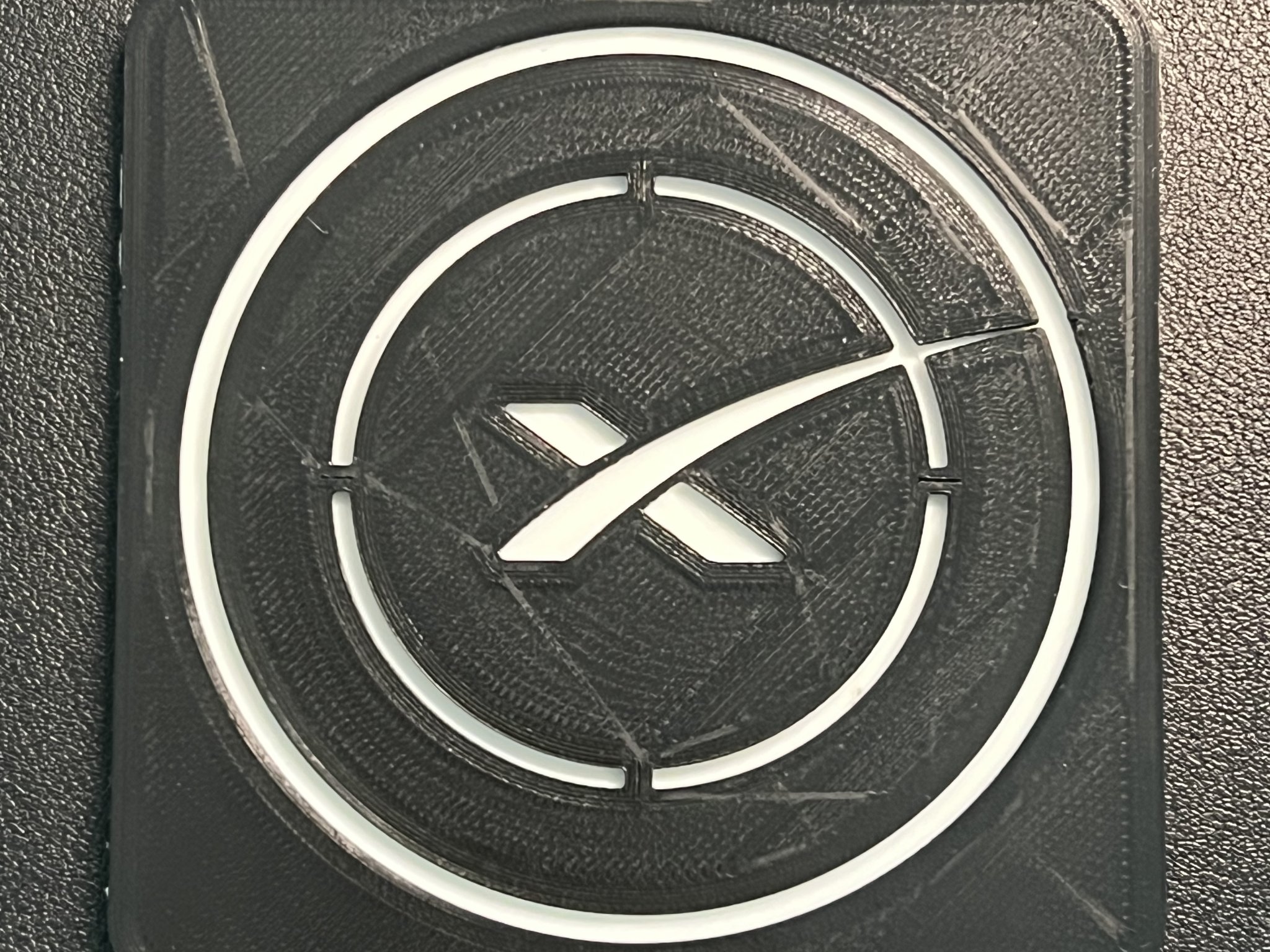 Đế lót ly Space X với logo độc đáo