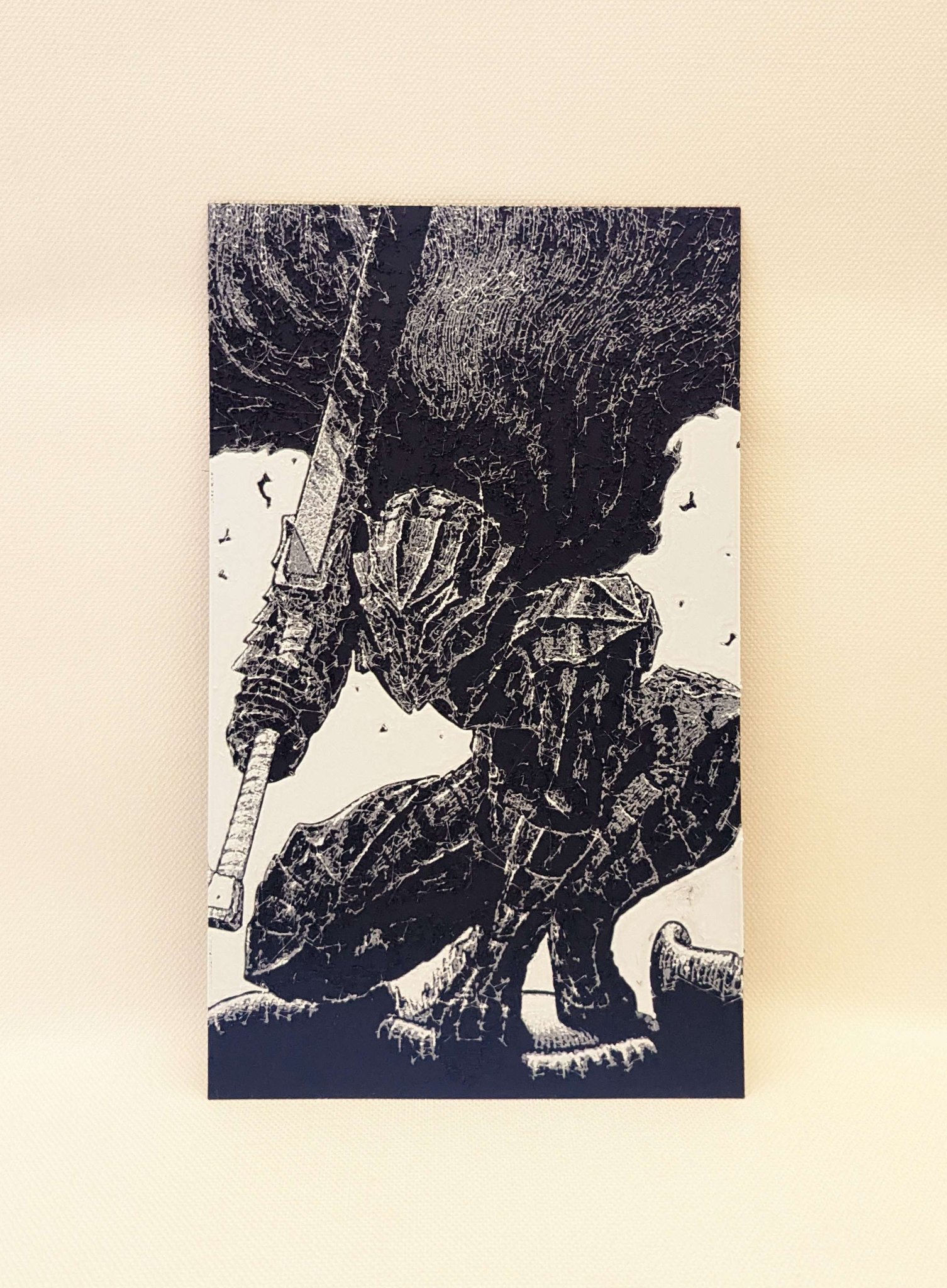 Giáp Berserker Guts với kiếm trong manga Berserk