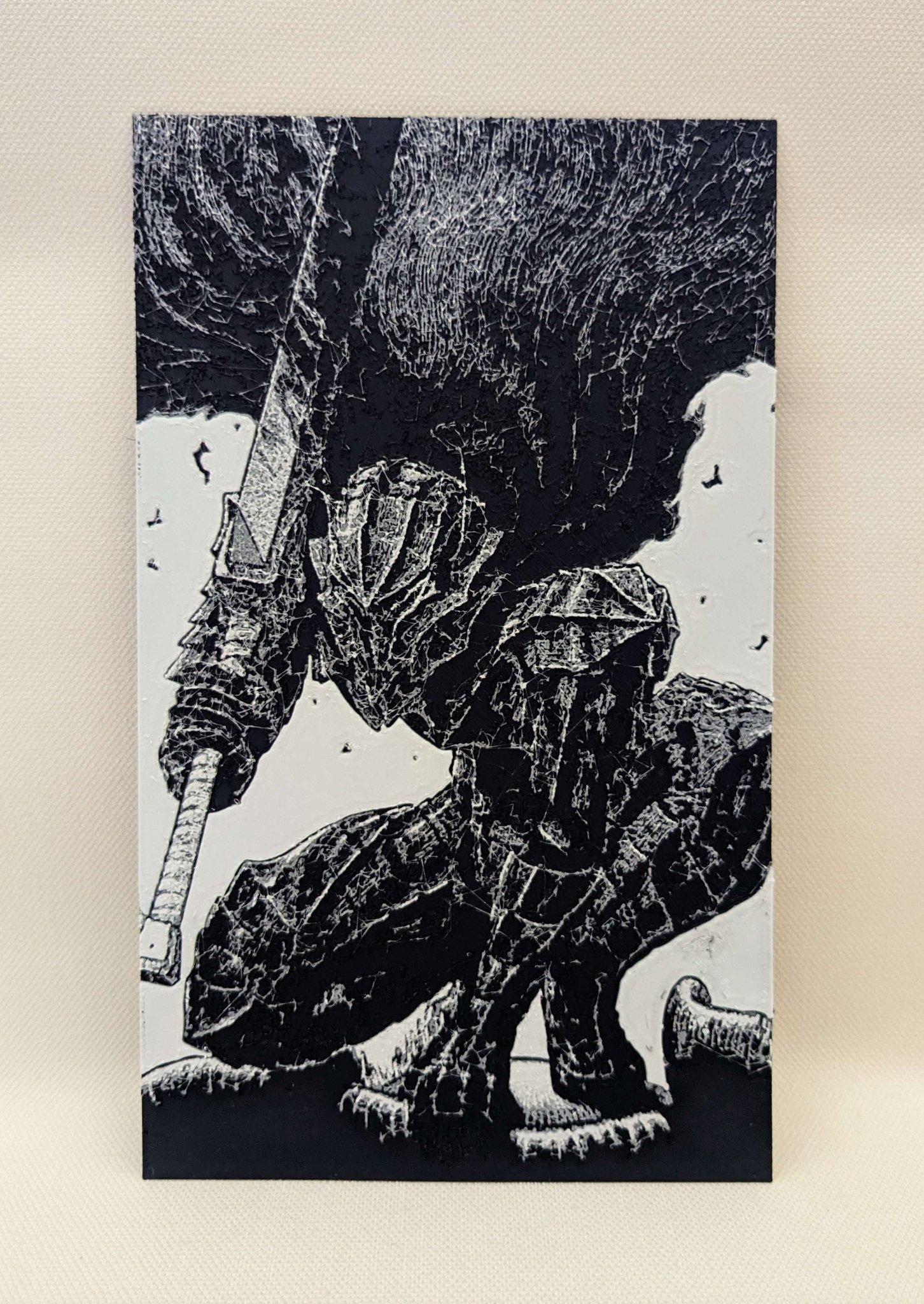 Giáp Berserker Guts với kiếm trong manga Berserk