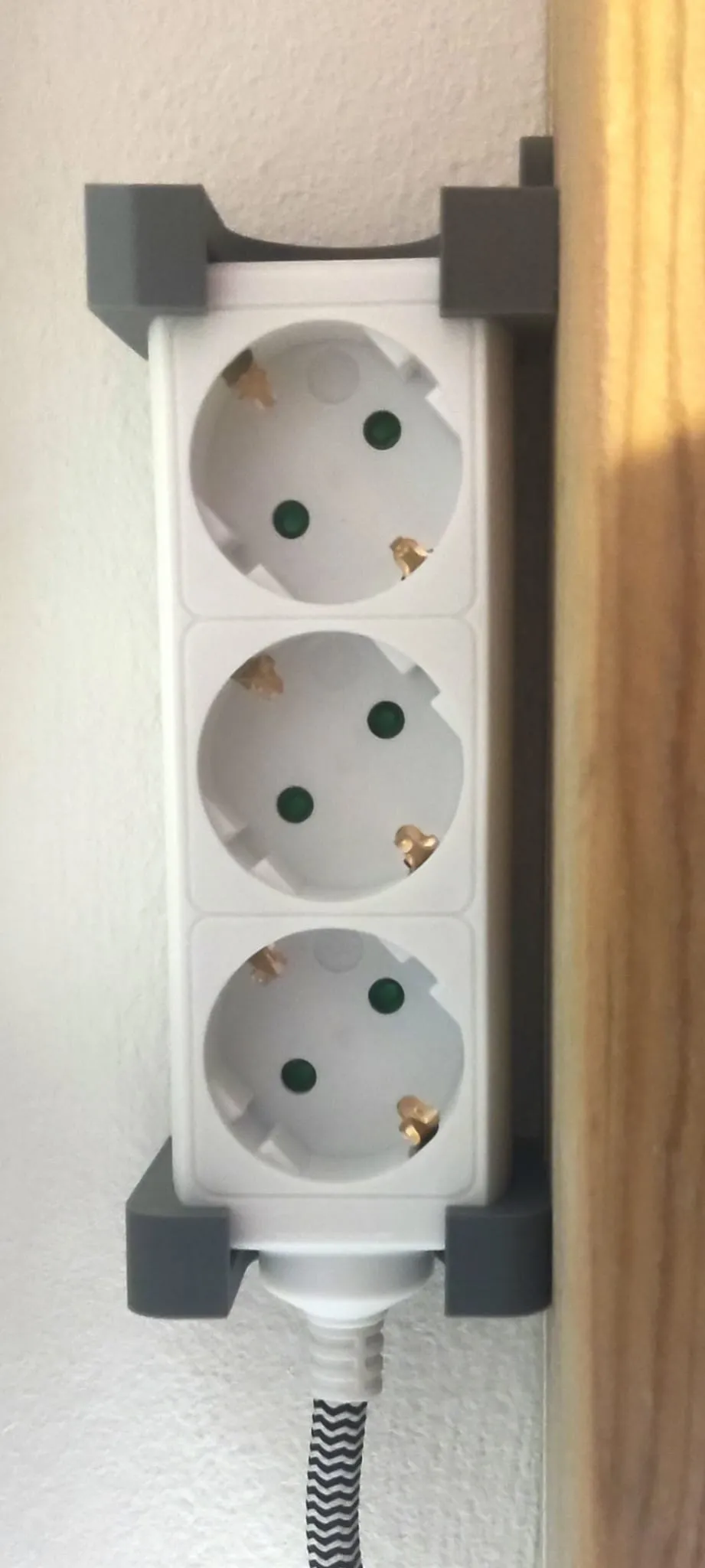 Giá đỡ cáp nối cho ổ cắm Action tại cửa hàng Hà Lan