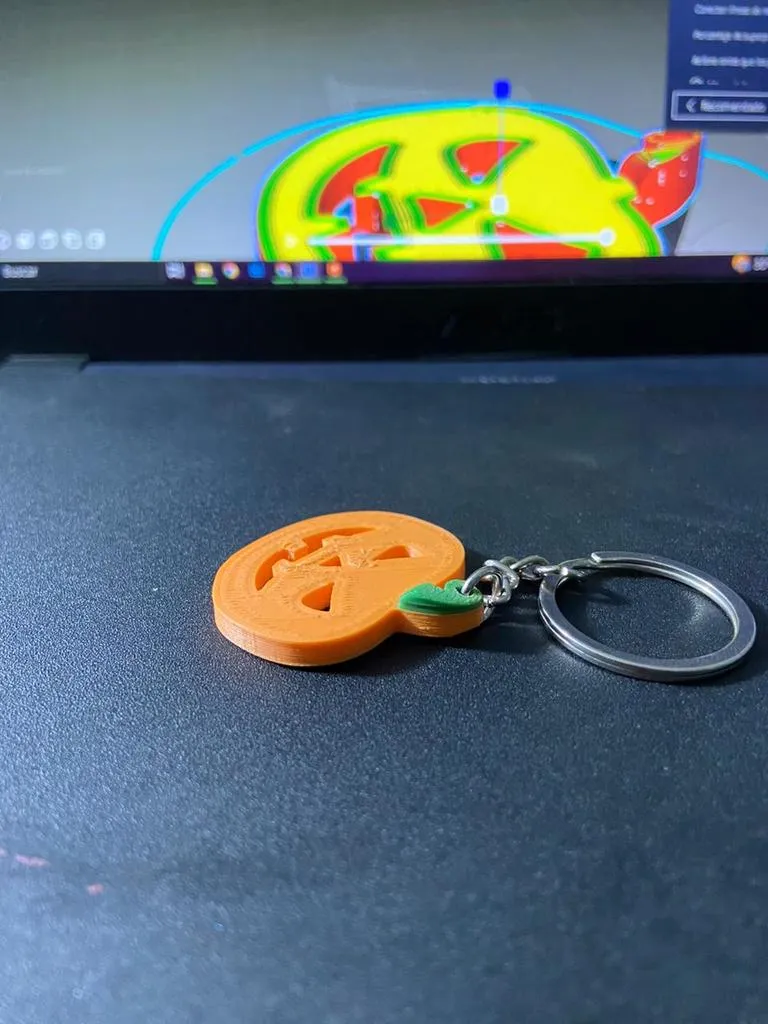 Móc khóa hình bí ngô in 3D hai màu