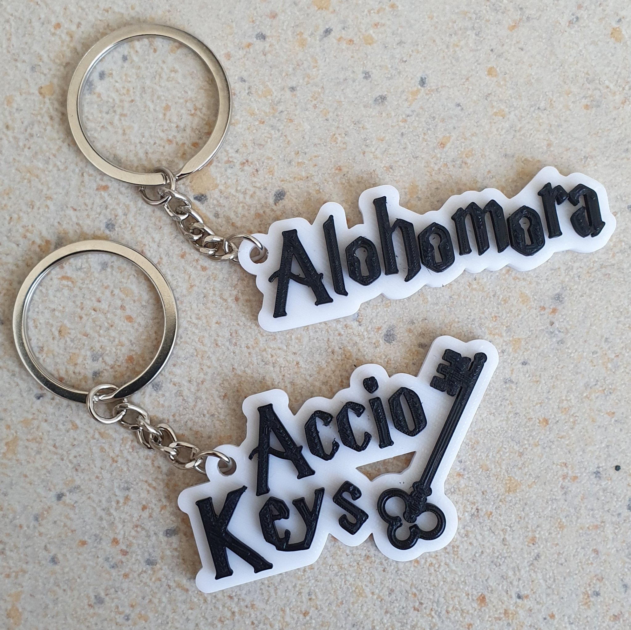 Móc khóa phép thuật Harry Potter Accio và Alohomora