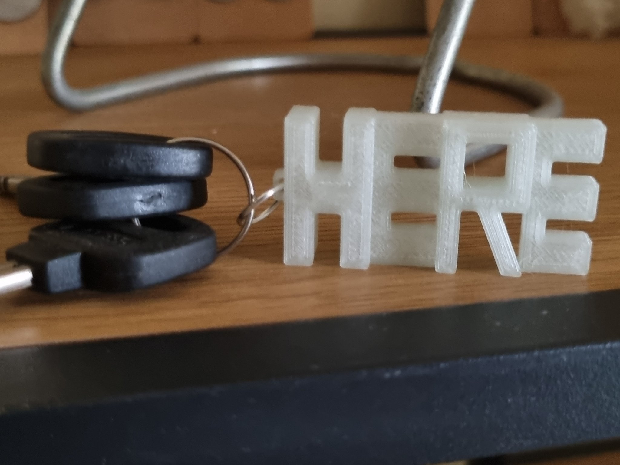 Móc chìa khóa tối giản phát sáng trong bóng tối