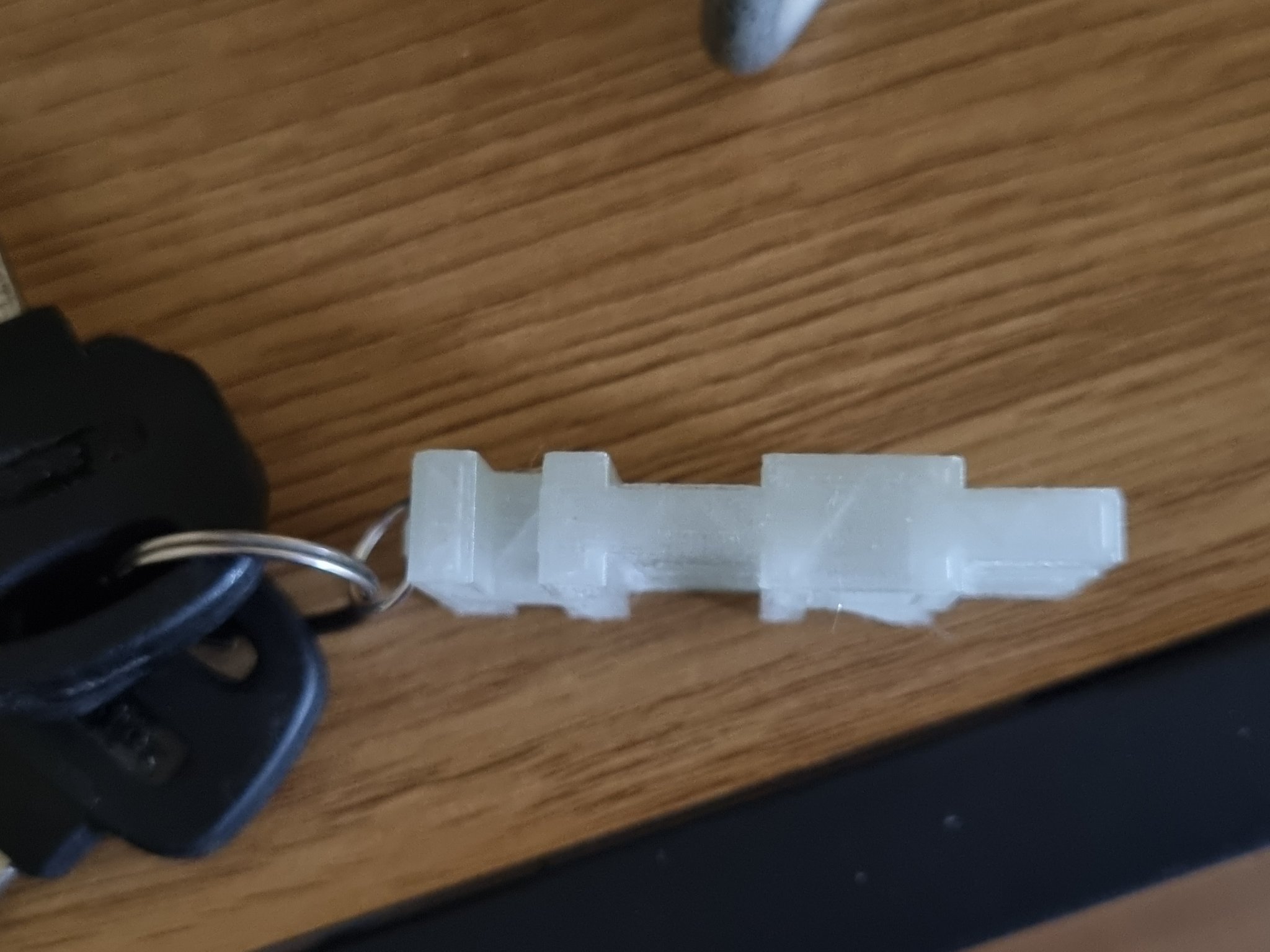 Móc chìa khóa tối giản phát sáng trong bóng tối