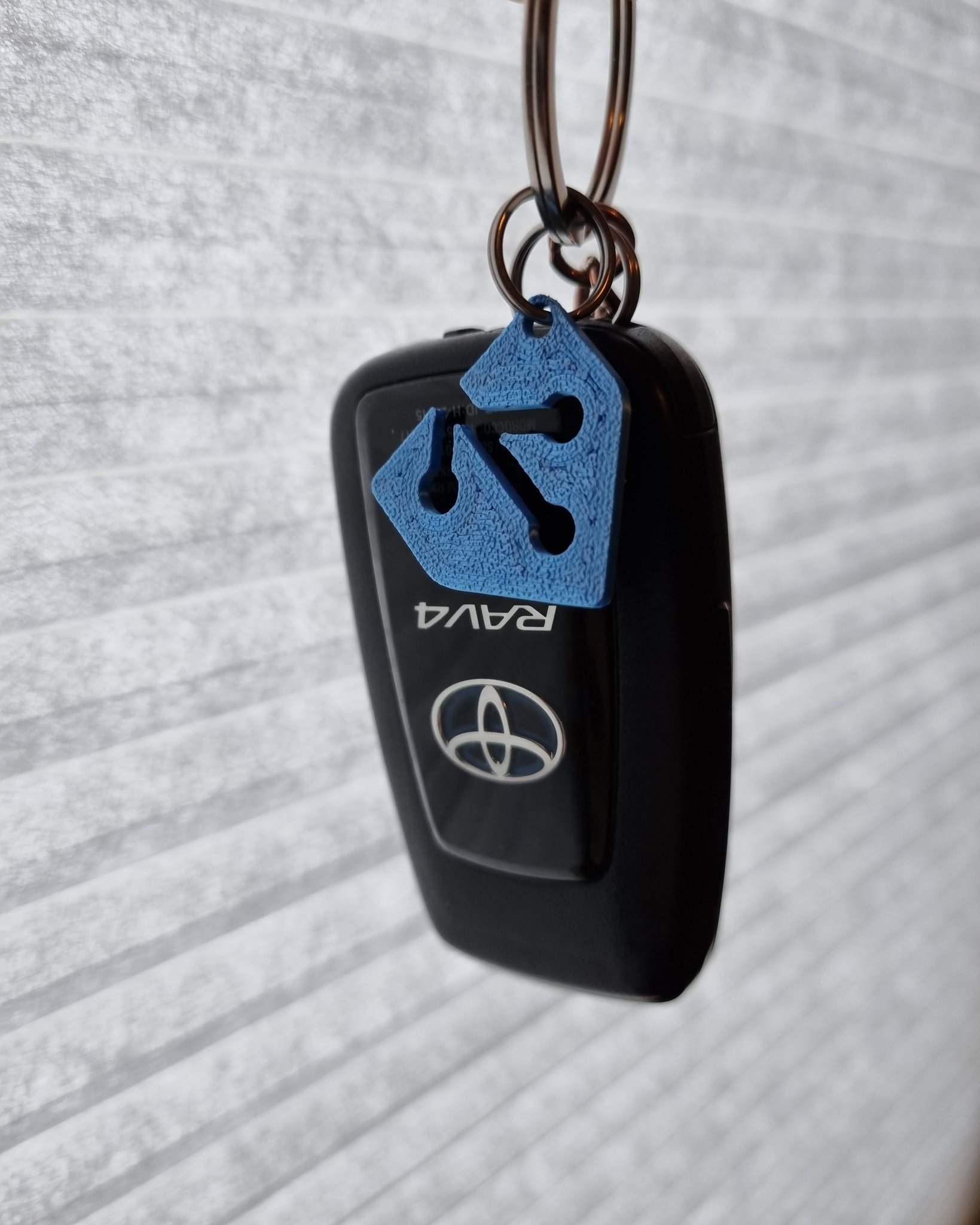 Móc khóa HomeAssistant với logo mới và cũ