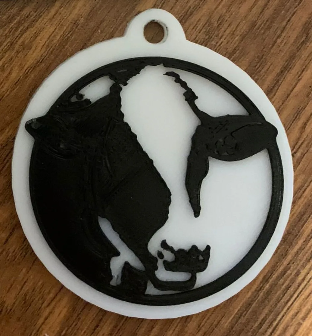 Móc chìa khóa hình con bò với màu sắc thay đổi