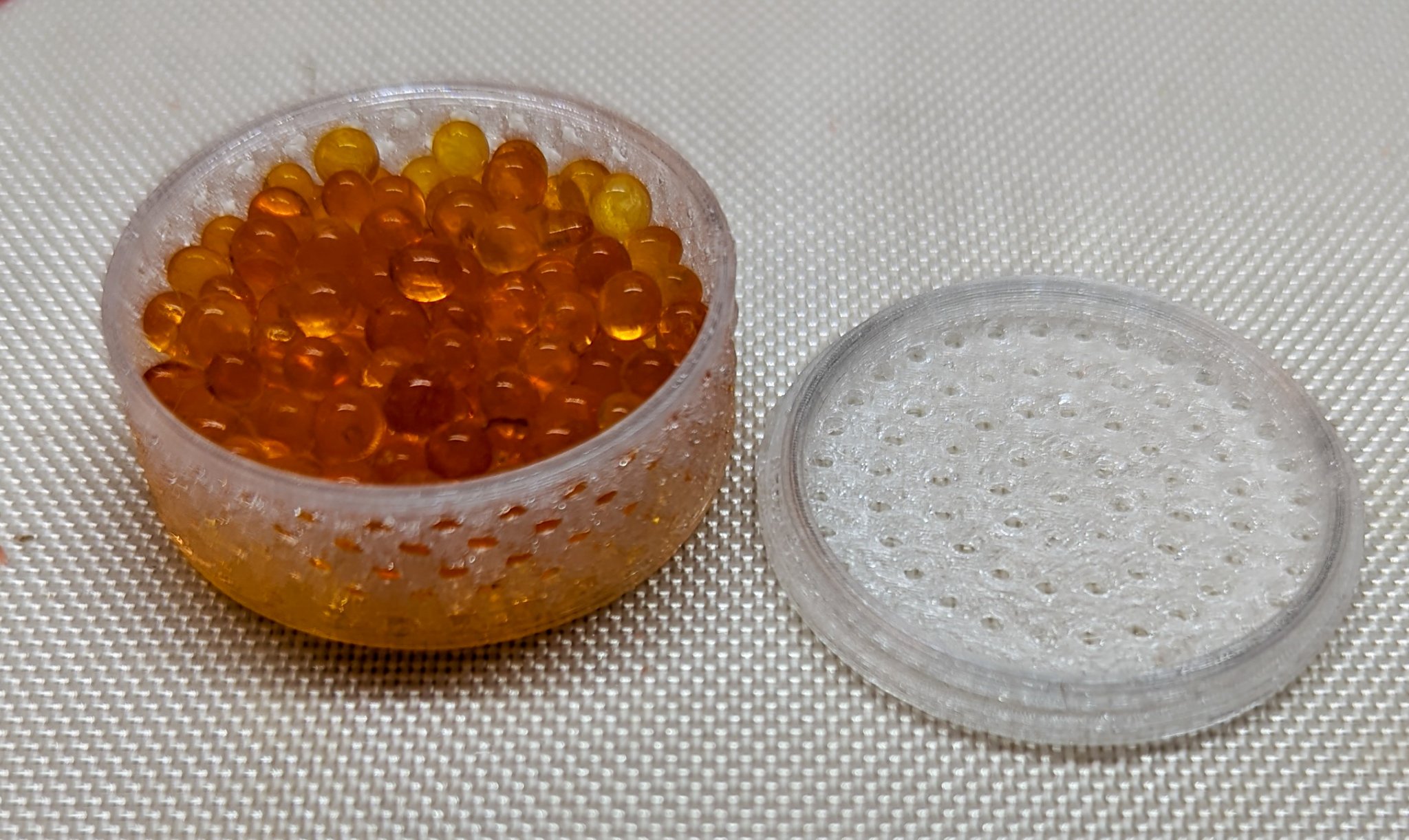 Puck hút ẩm cho bộ sạc máy trợ thính Phonak/Unitron