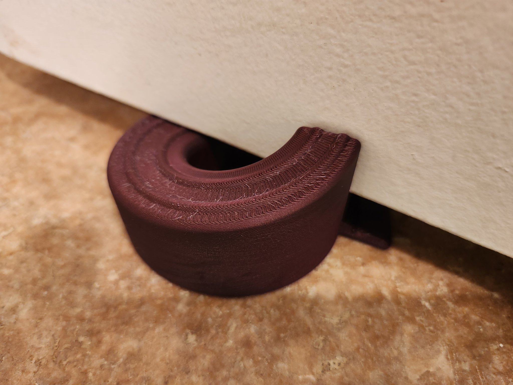 Đồ chặn cửa thiết kế hình xoắn ốc tiết kiệm không gian