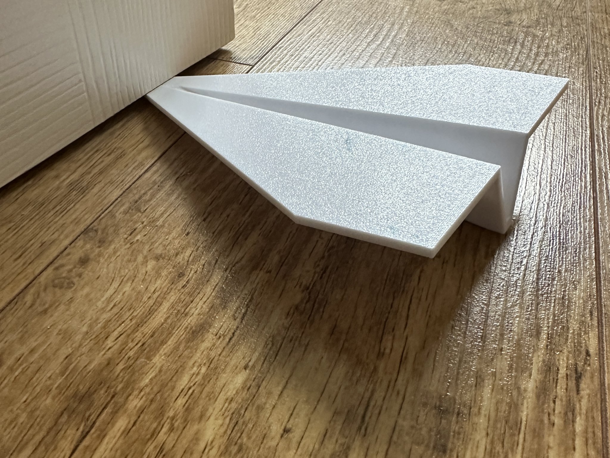 Chặn cửa hình máy bay giấy dễ in không cần hỗ trợ