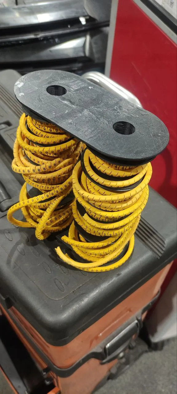 Giá đỡ cuộn nhãn dây cáp tổ chức gọn gàng