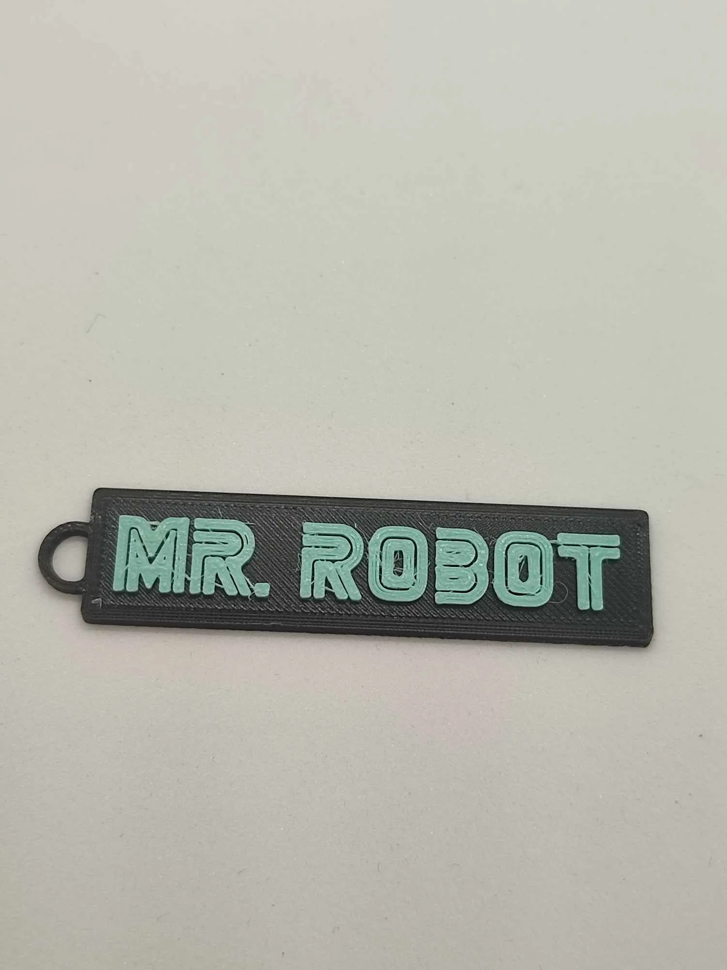 Móc khóa biểu tượng mr.robot từ series "Mr. Robot