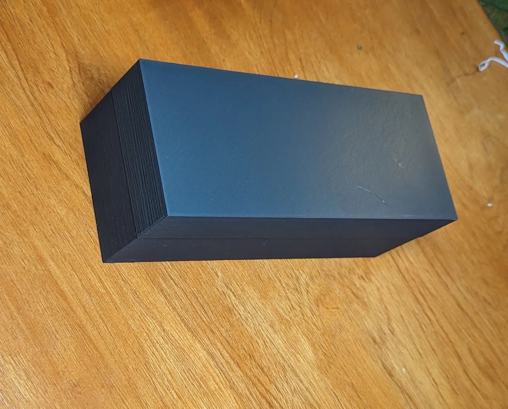 Giá đỡ thẻ có ngăn chia tích hợp trong đáy hộp