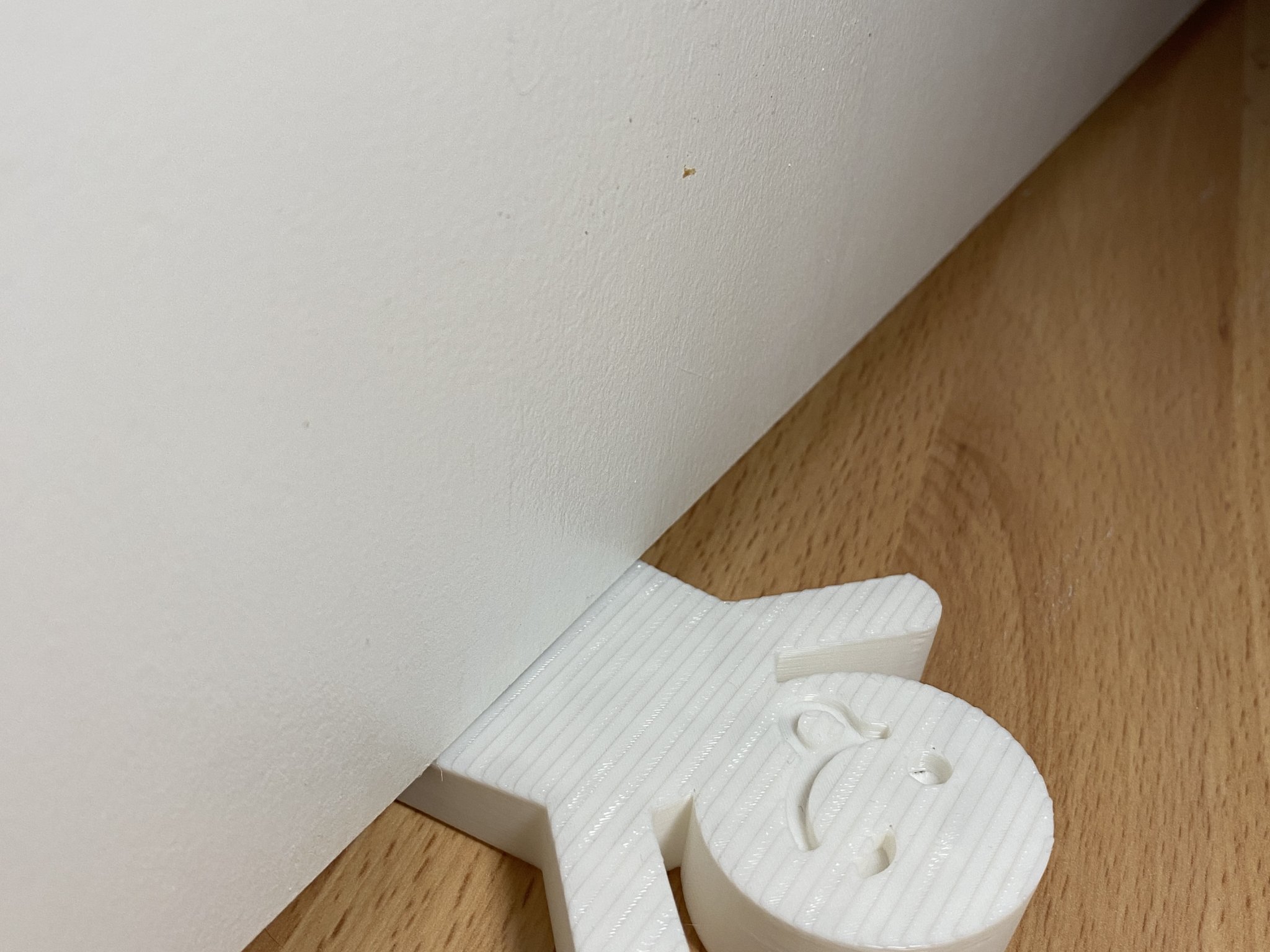 Giá đỡ cửa hình người vui vẻ giữ cửa mở