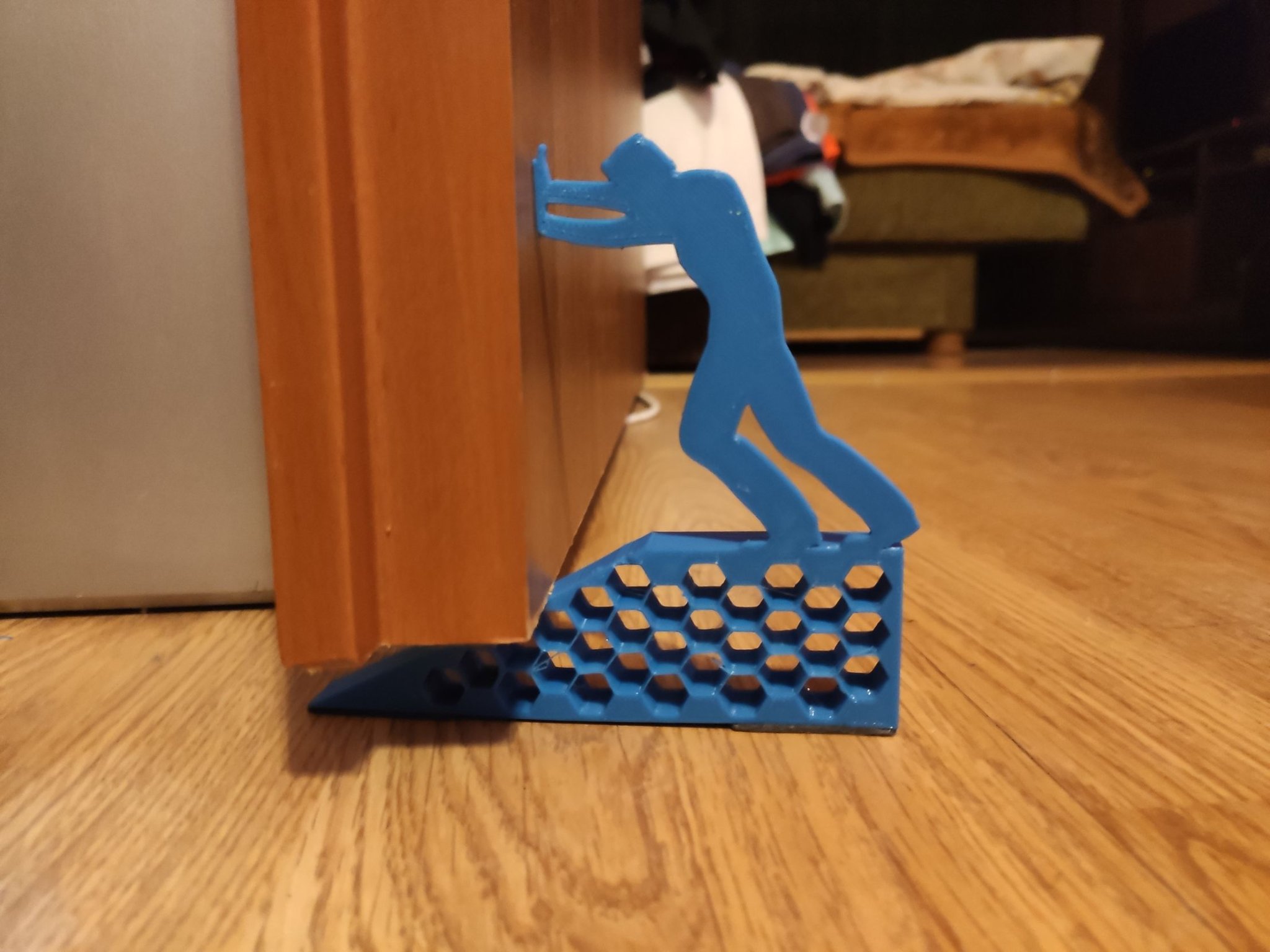 Đế chặn cửa hình người đẩy đơn giản