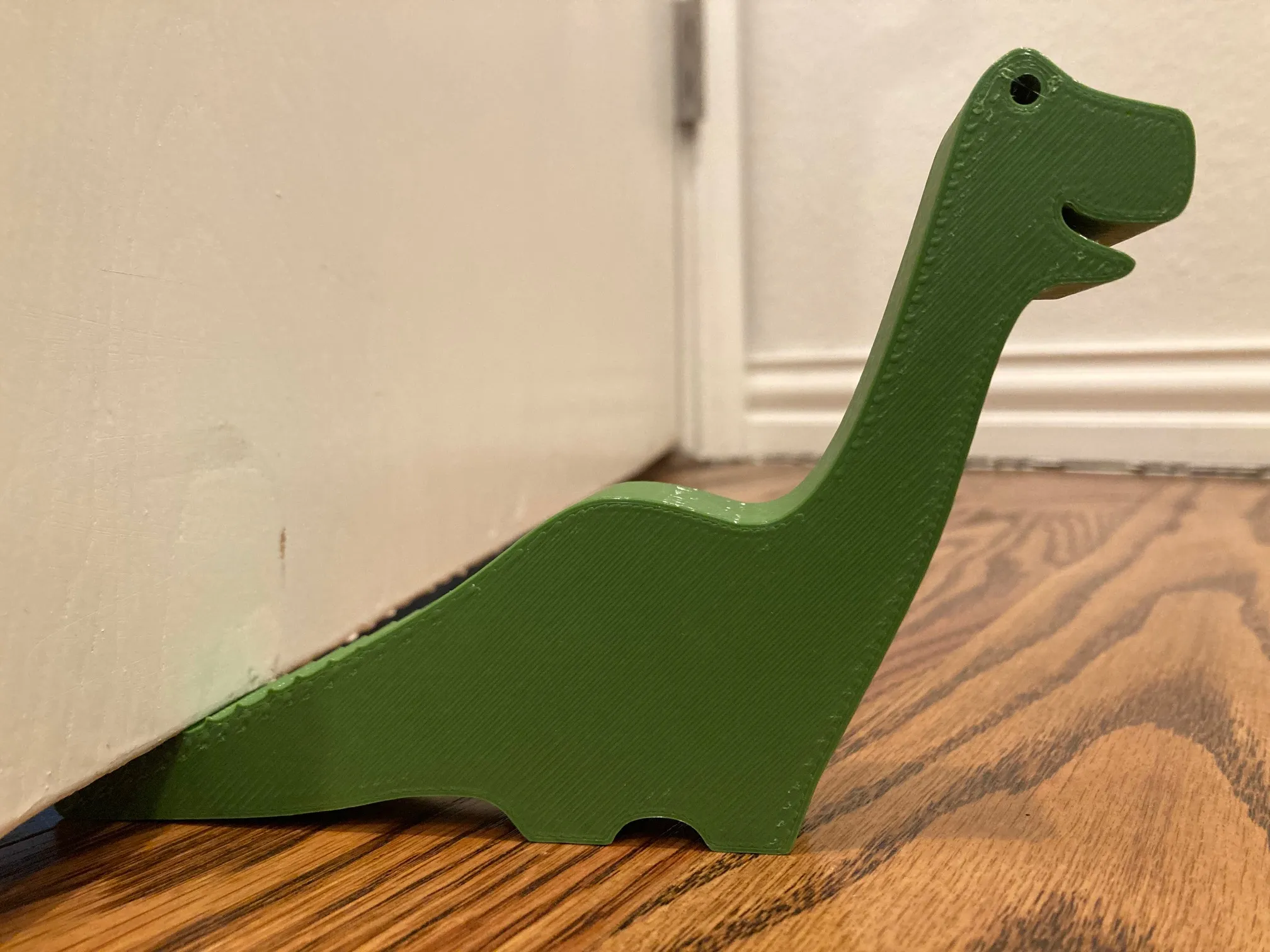 Giá đỡ cửa hình khủng long dễ thương