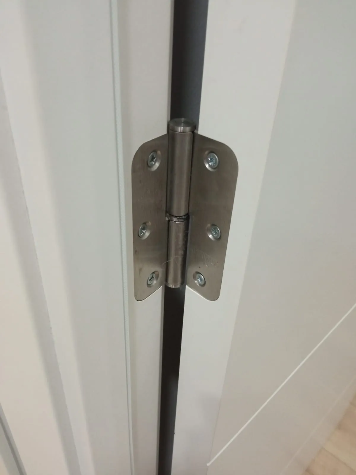 Bộ chặn cửa treo từ bản lề