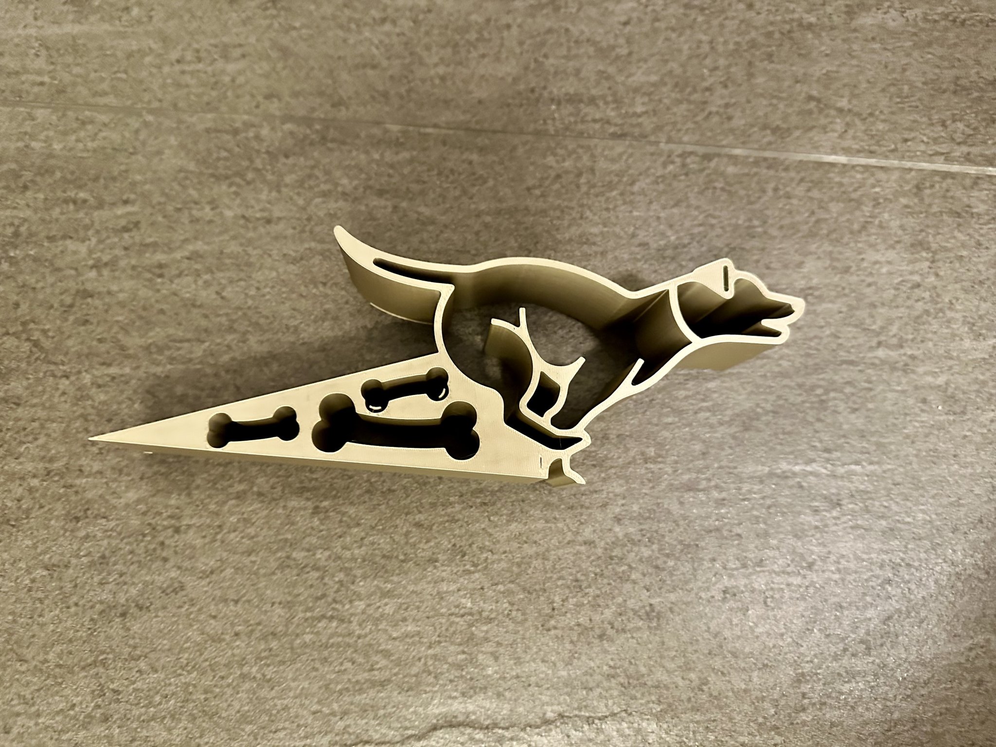 Đế chặn cửa hình chó chạy ngoài trời