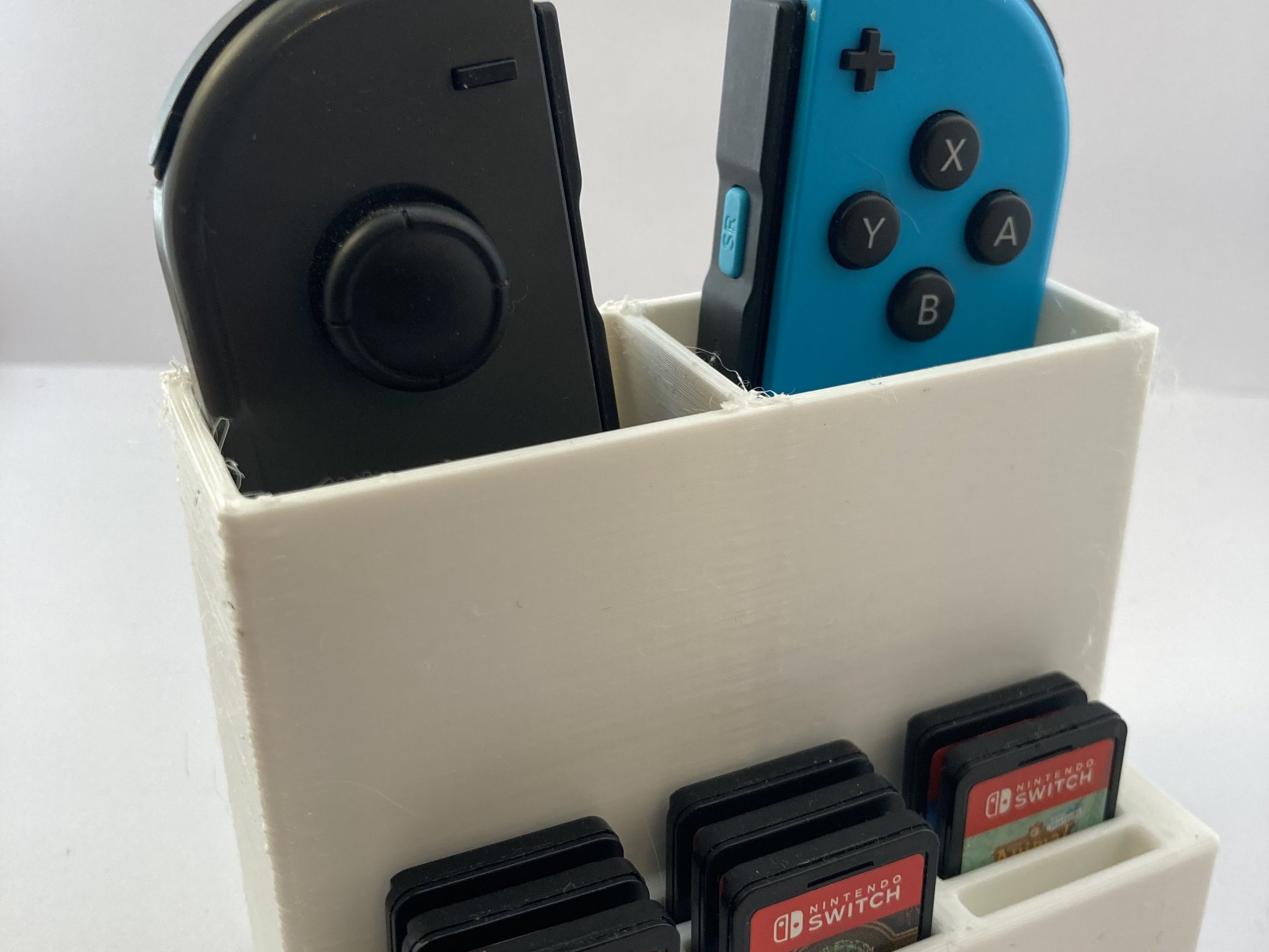 Giá đỡ trò chơi và Joycon cho Nintendo Switch