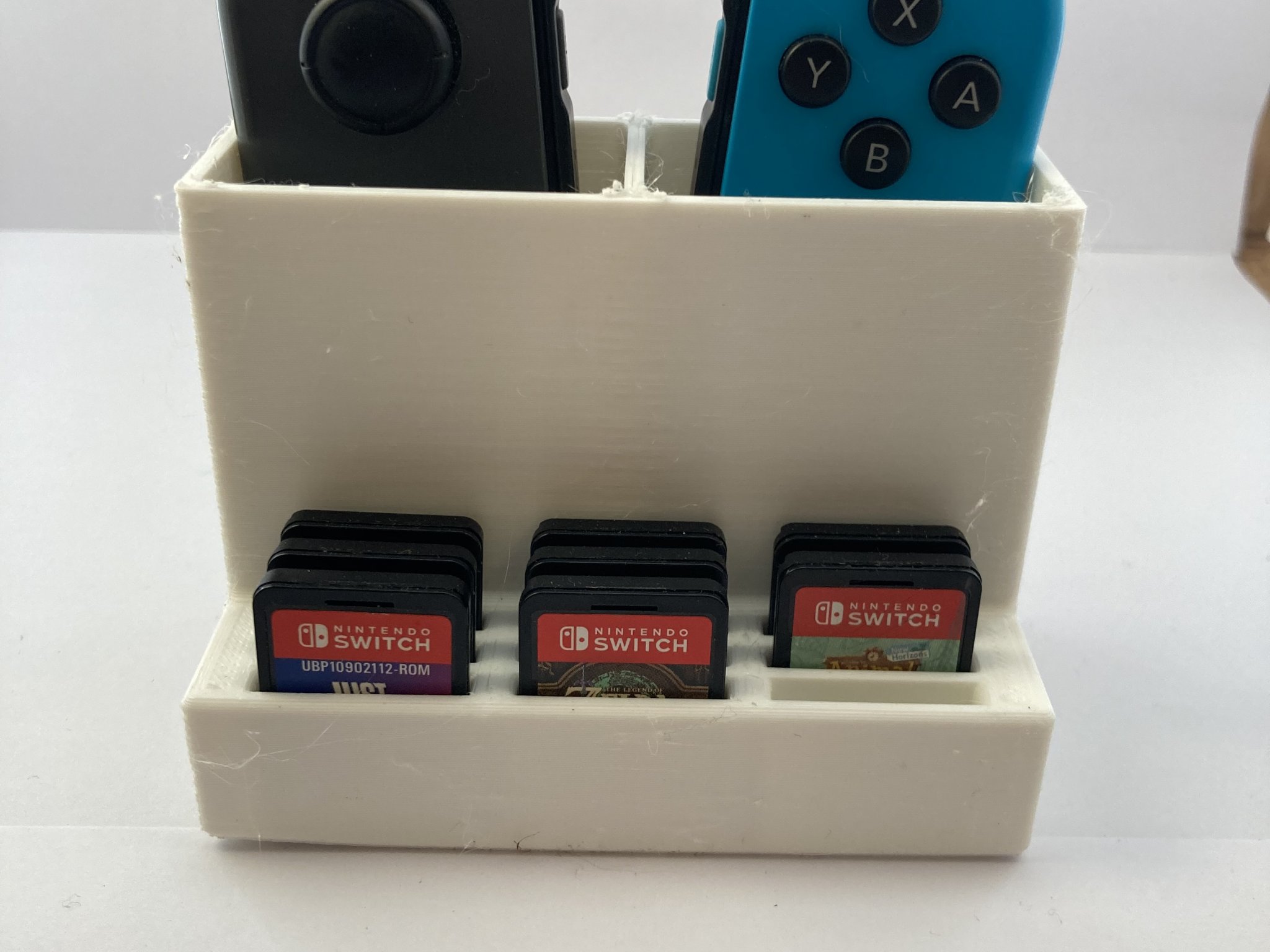 Giá đỡ trò chơi và Joycon cho Nintendo Switch