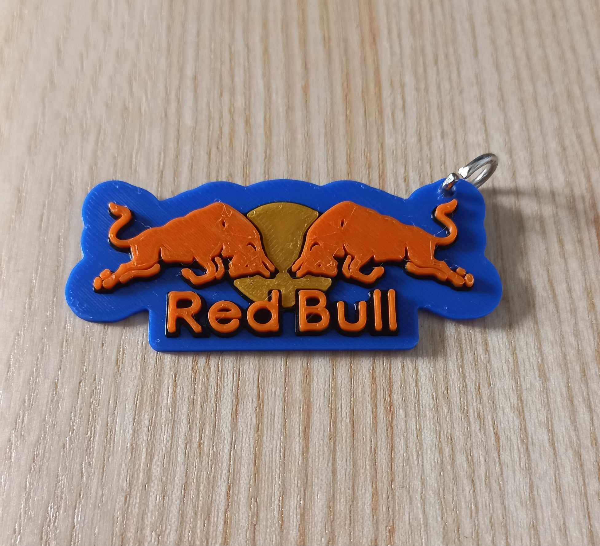 Móc khóa logo Red Bull in 3D nhiều màu sắc
