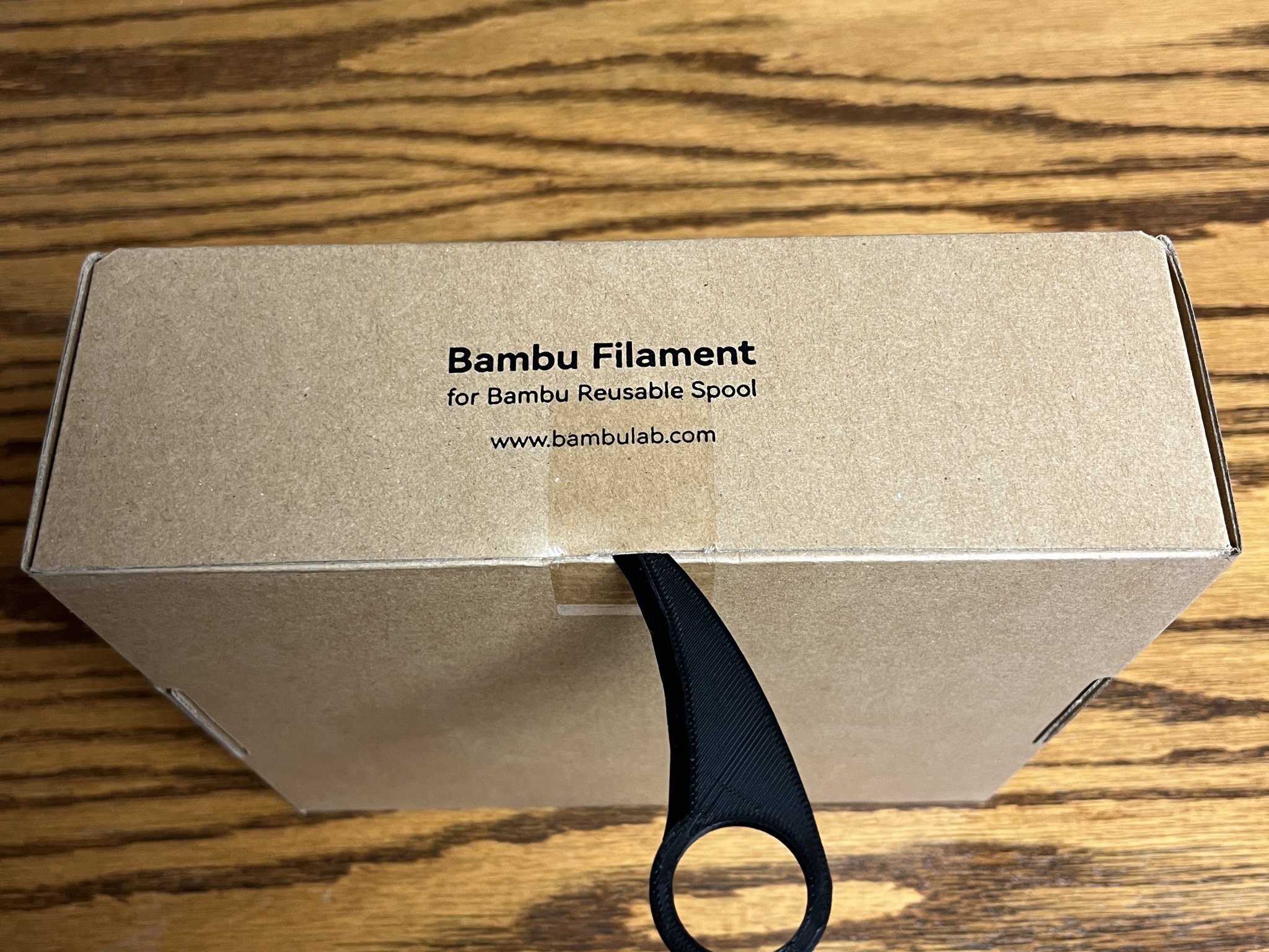 Móc mở hộp hình móng vuốt khủng long