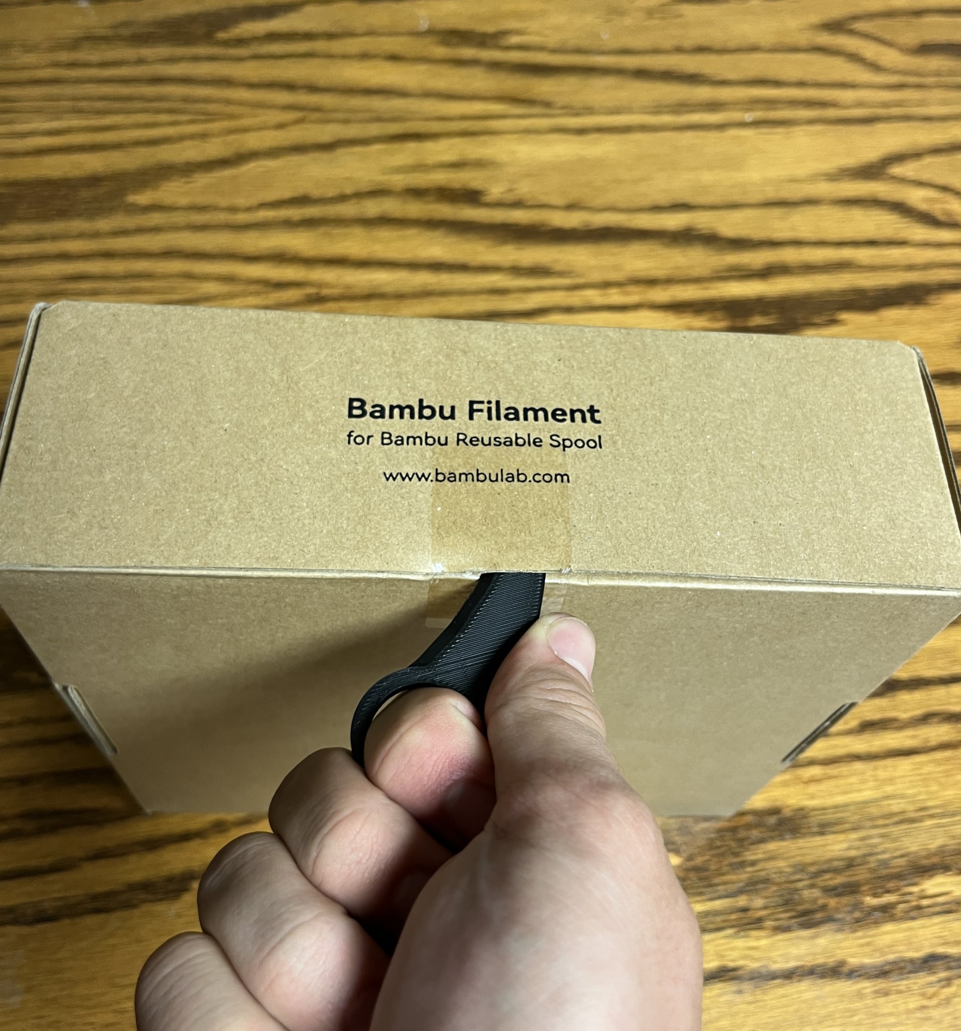 Móc mở hộp hình móng vuốt khủng long