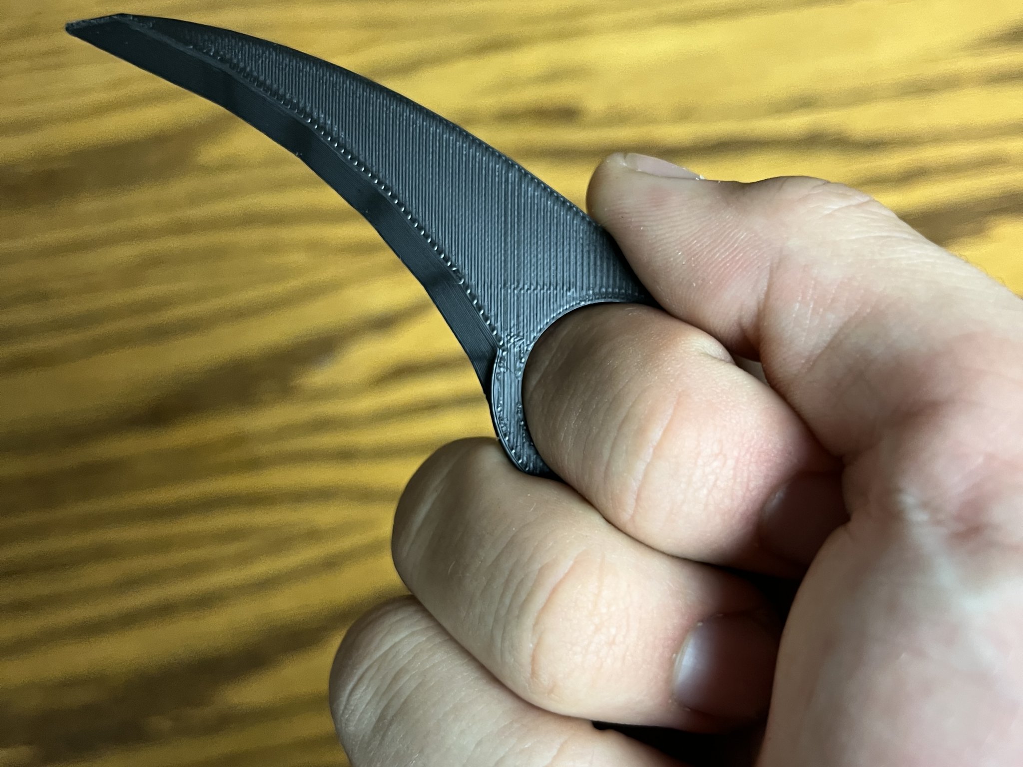 Móc mở hộp hình móng vuốt khủng long