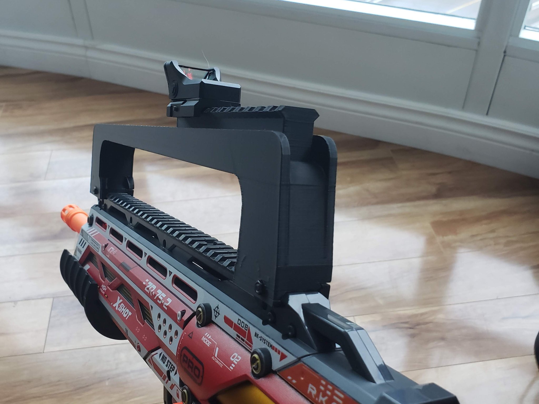 Tay Cầm X-Shot Longshot FAMAS Kèm Ray Picatinny 2 Độ