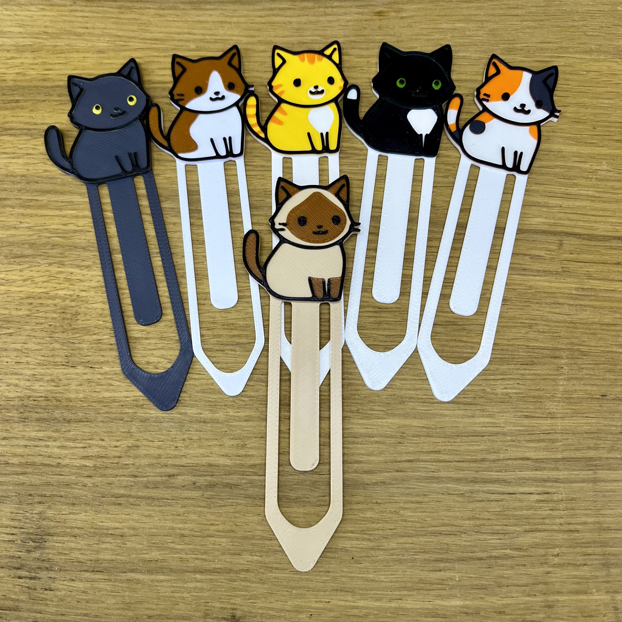 Móc Khóa Đọc Sách Mèo Xiêm Dễ Thương