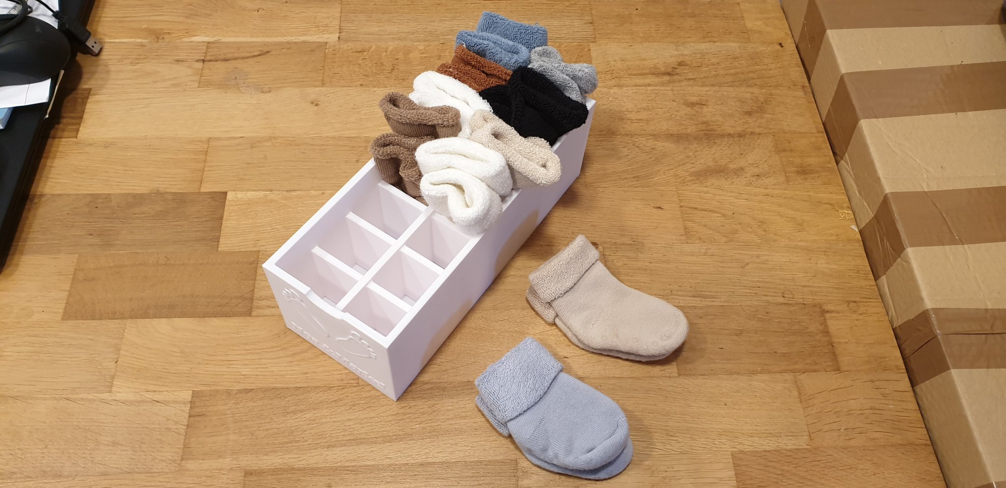 Hộp tổ chức tất cho bé yêu