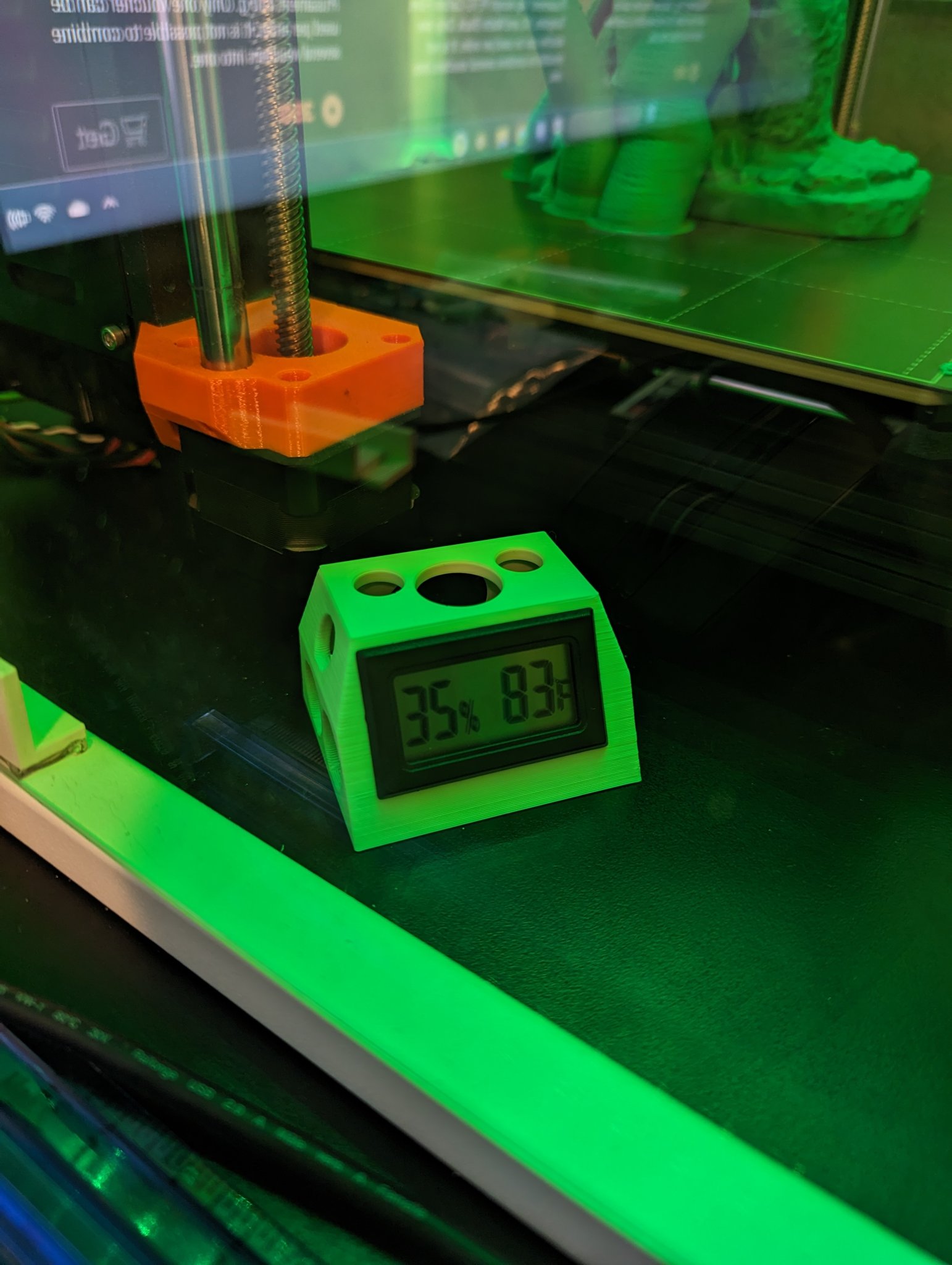 Giá đỡ đồng hồ đo nhiệt độ và độ ẩm trong hộp kín