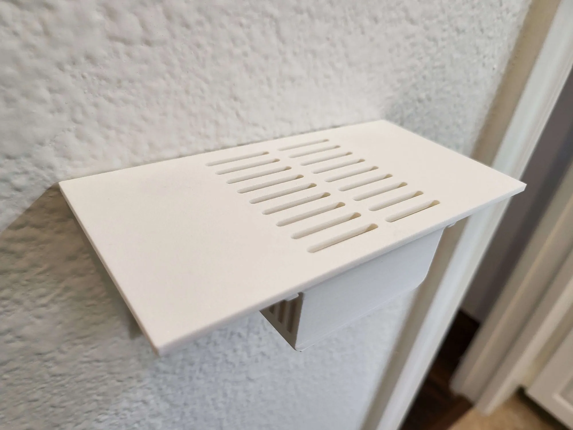 Giá đỡ điện thoại có ngăn chứa tinh chất khử mùi