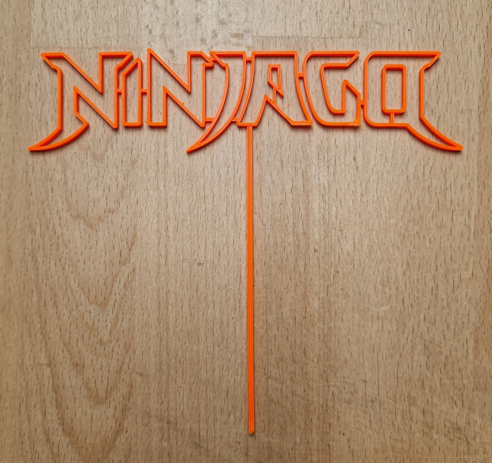 Nắp bánh sinh nhật hình biểu tượng Lego Ninjago