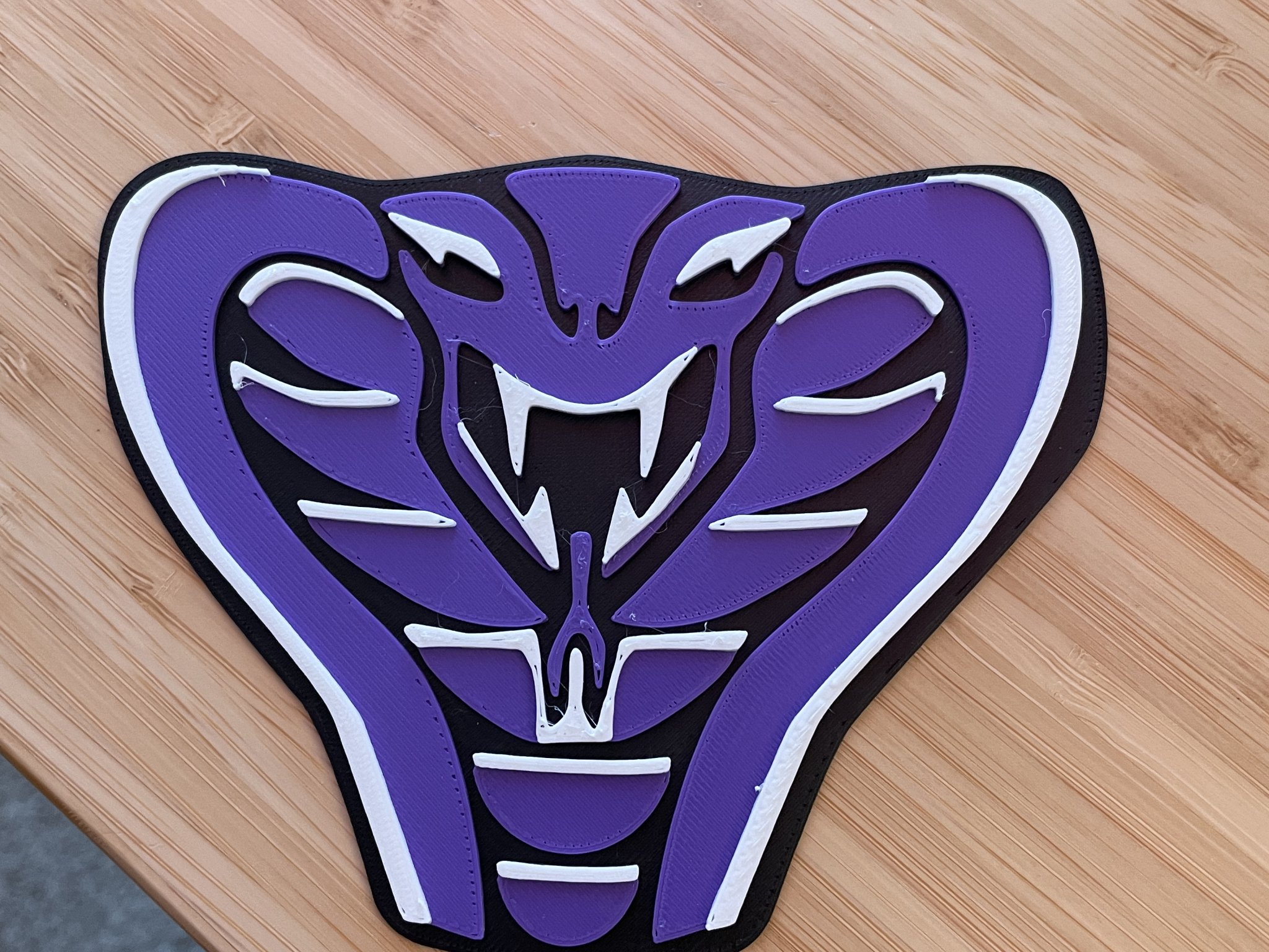 Biểu tượng Globo Gym Purple Cobras