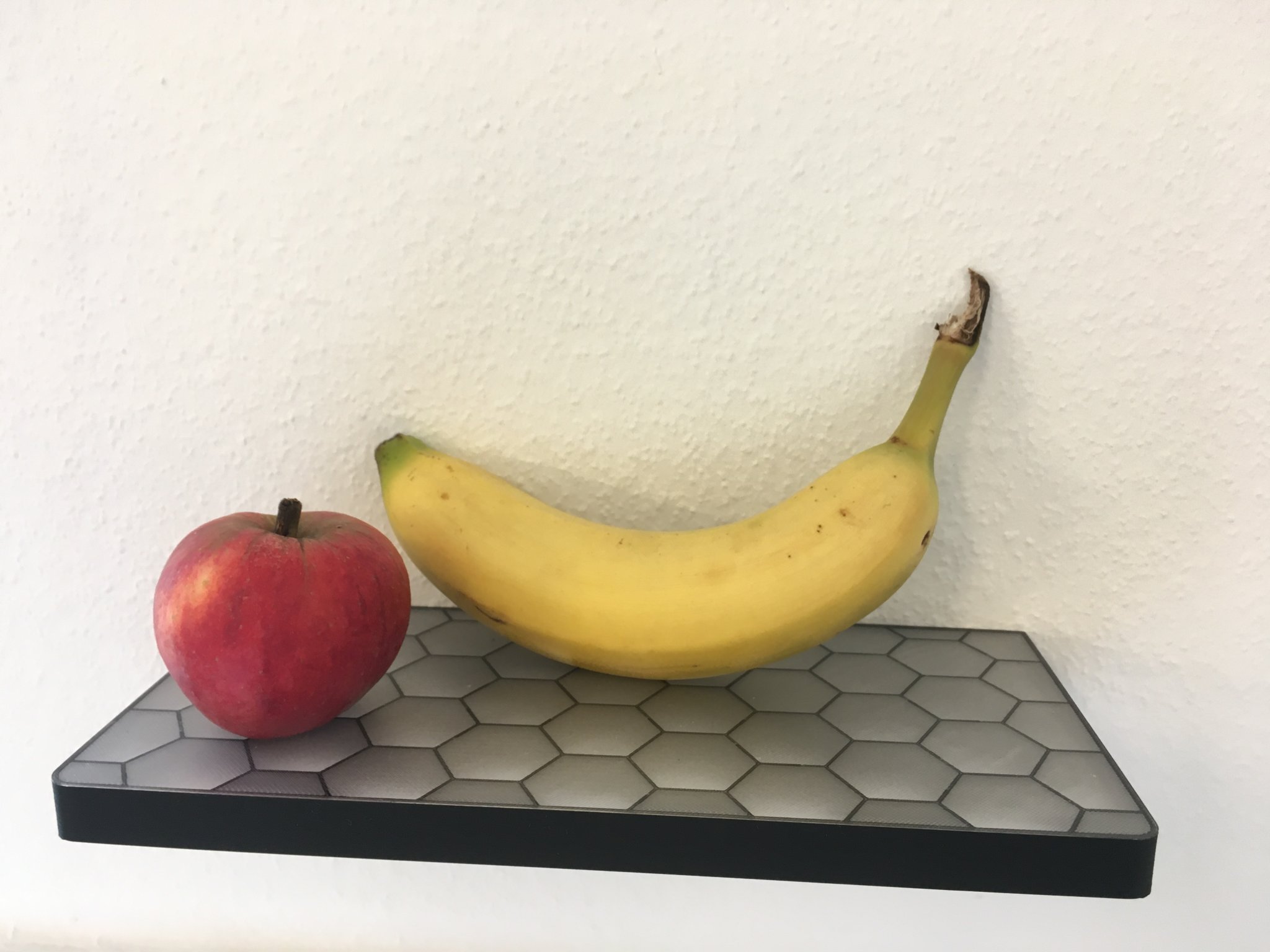 Giá treo tường hình lục giác với phần lấp đầy nổi bật