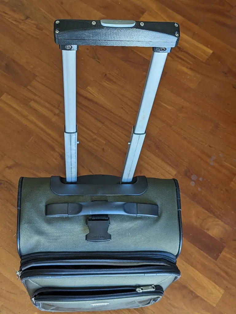 Tay cầm thay thế cho xe đẩy Samsonite