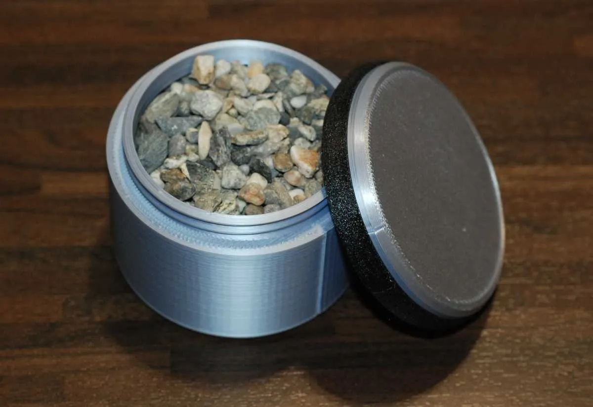 Chặn cửa hình trụ đổ đầy sỏi để tăng trọng lượng và ...