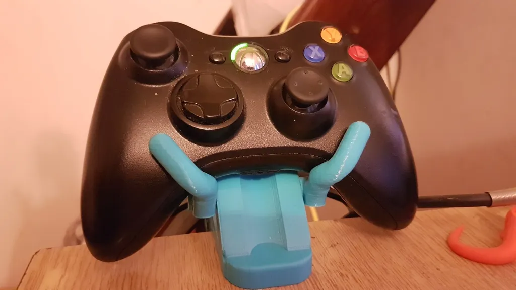 Giá đỡ tai nghe và tay cầm gắn bàn điều khiển