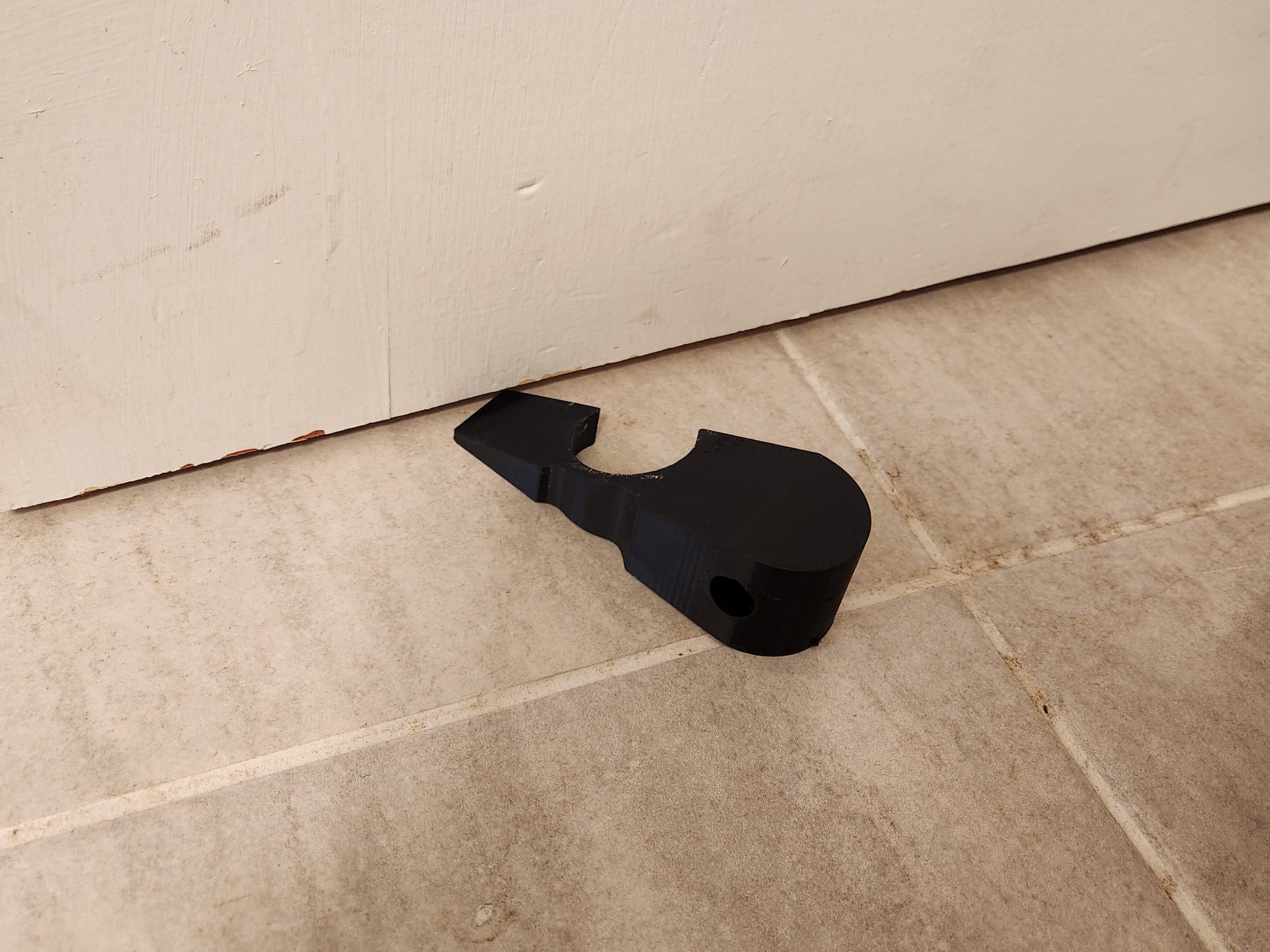 Cụm giữ cửa đa năng và chặn cửa