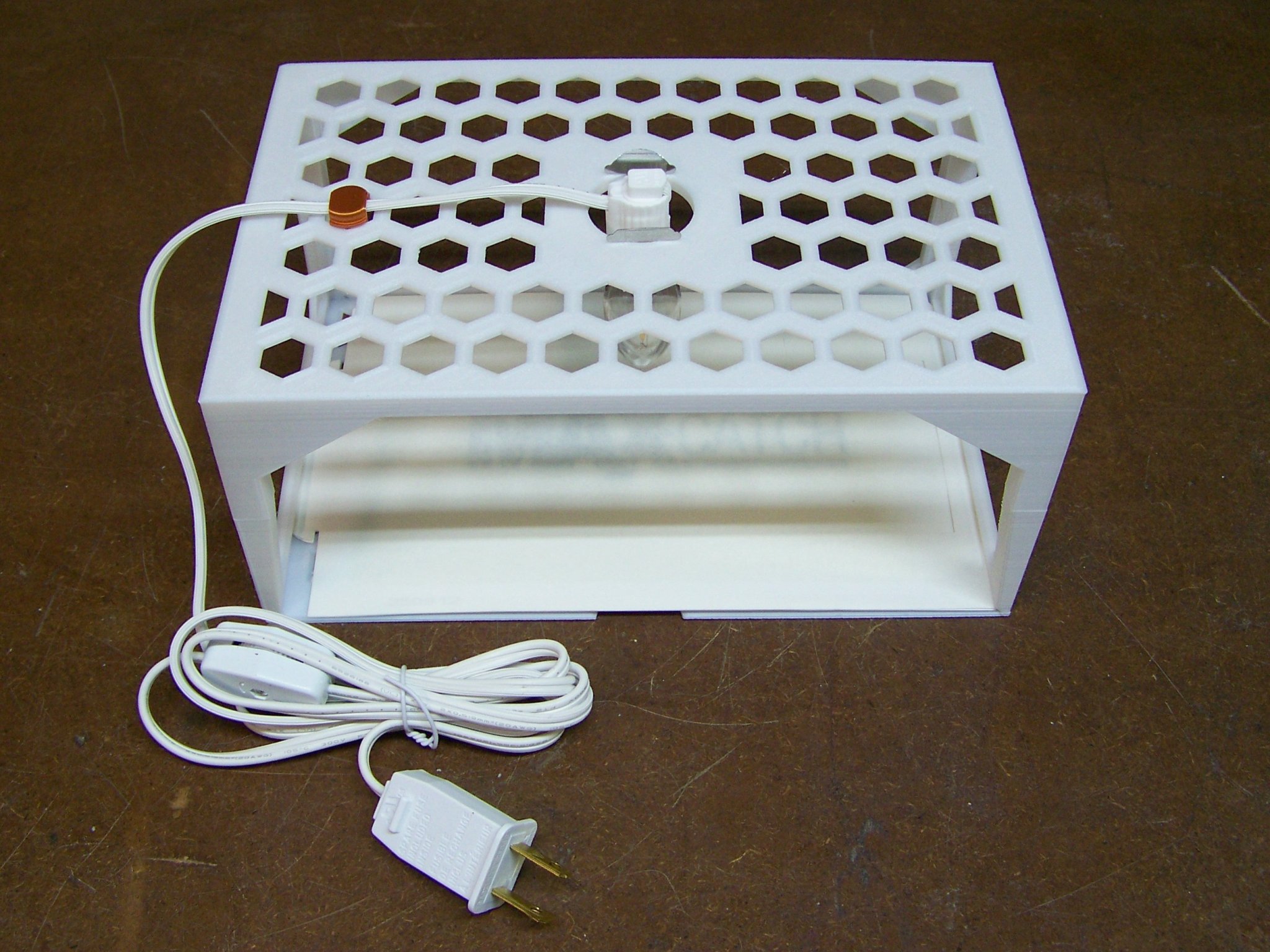 Bẫy bọ chét với đèn chiếu sáng và miếng dính