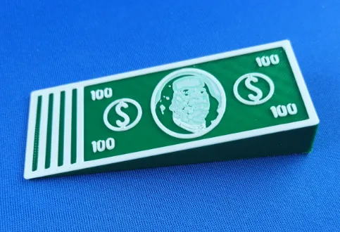 Keil chặn cửa hình dáng bó đô la