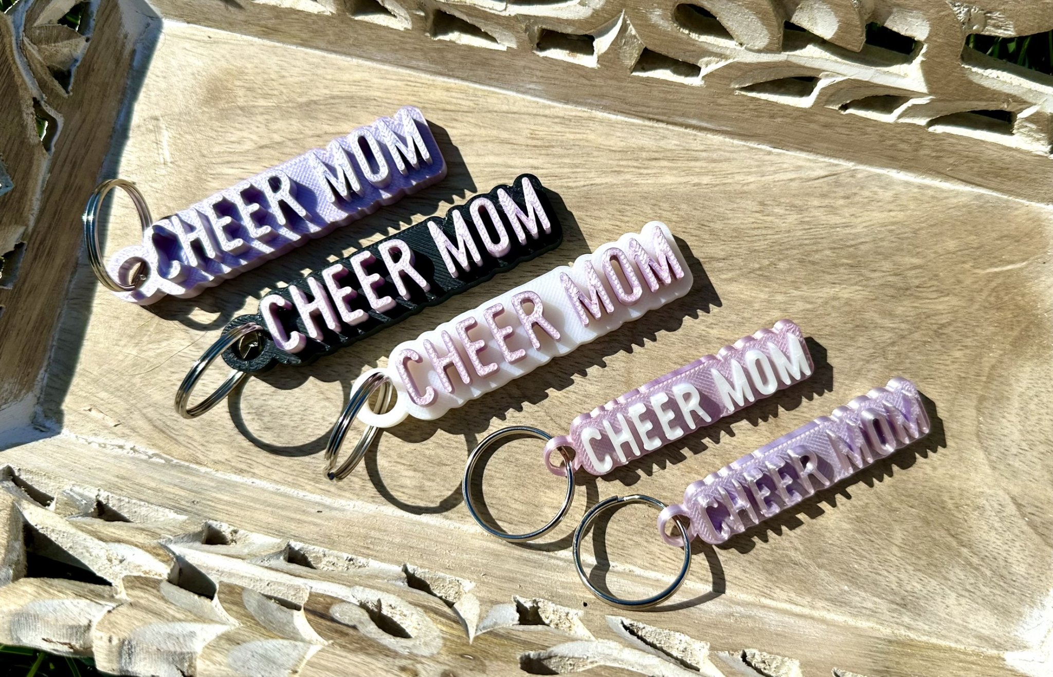 Móc khóa cho mẹ cổ vũ với phiên bản AMS