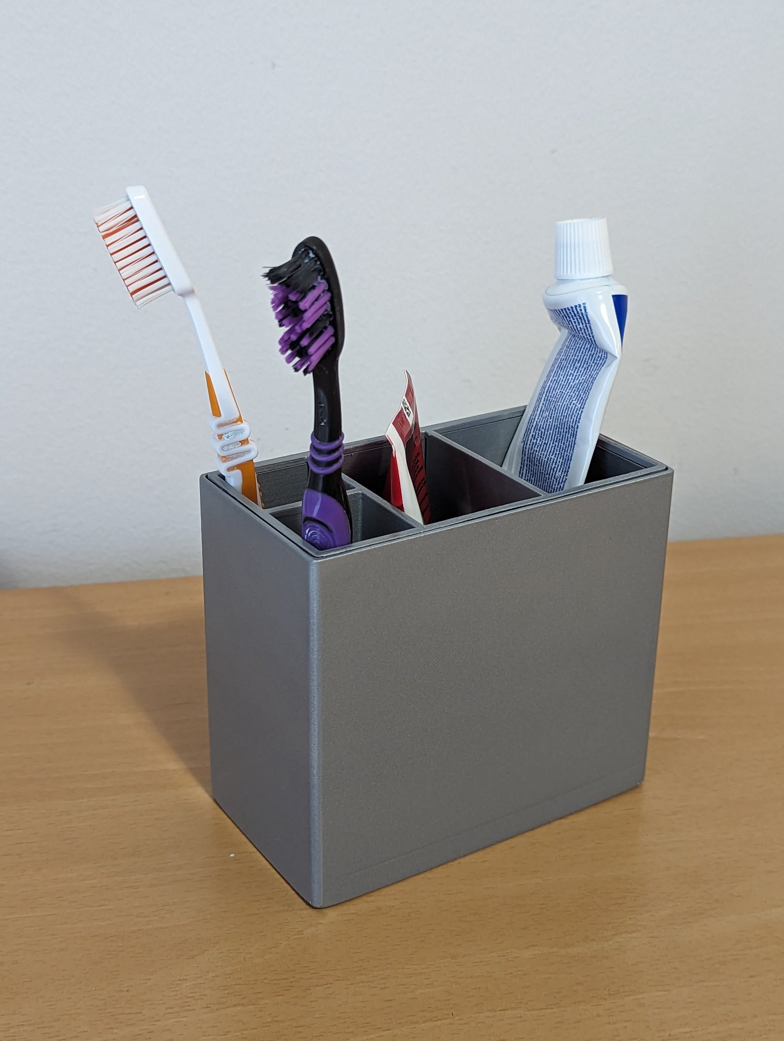 Giá đỡ bàn chải và kem đánh răng tiện lợi