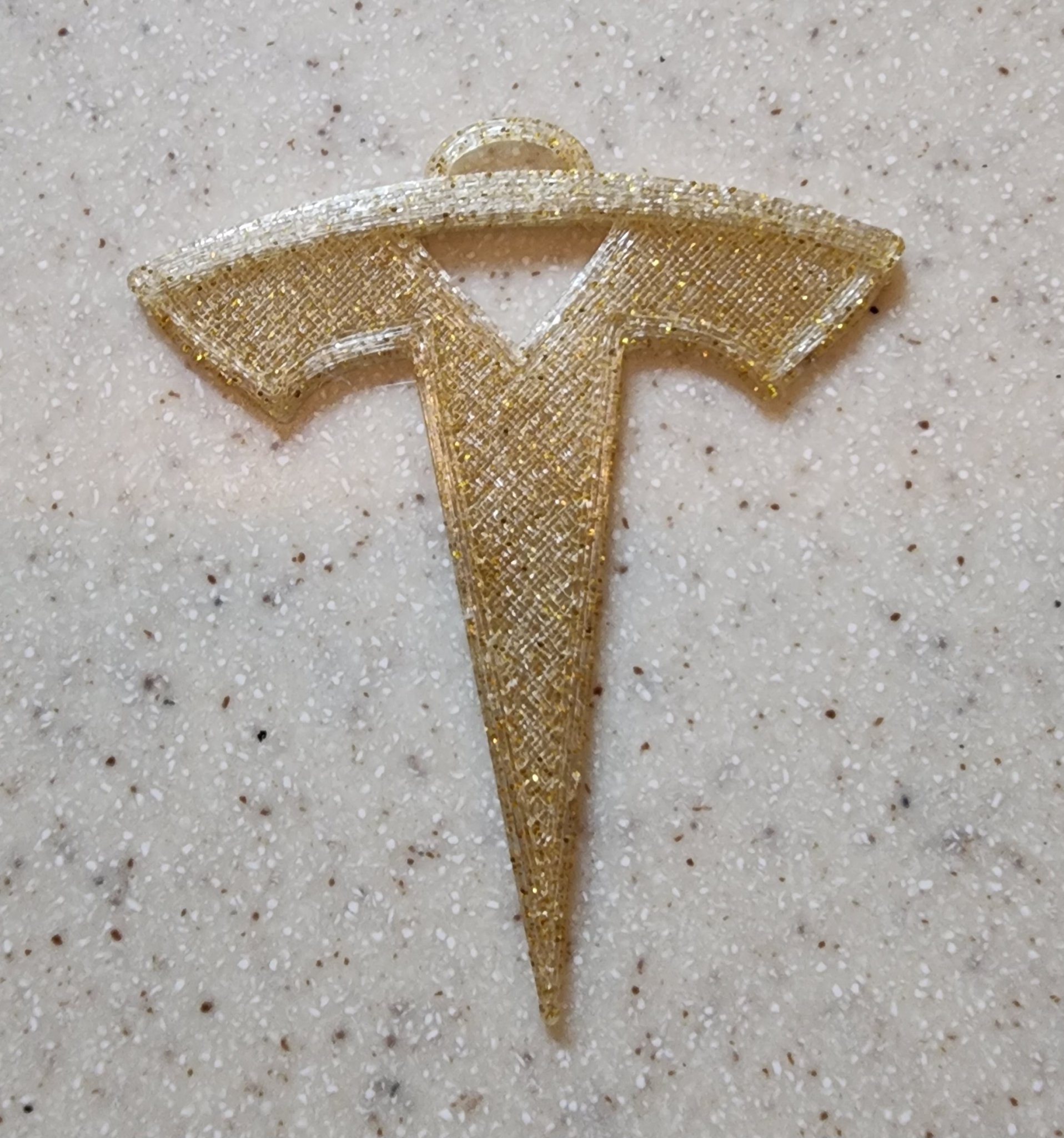 Biểu tượng xe Tesla cho trang trí và phụ kiện