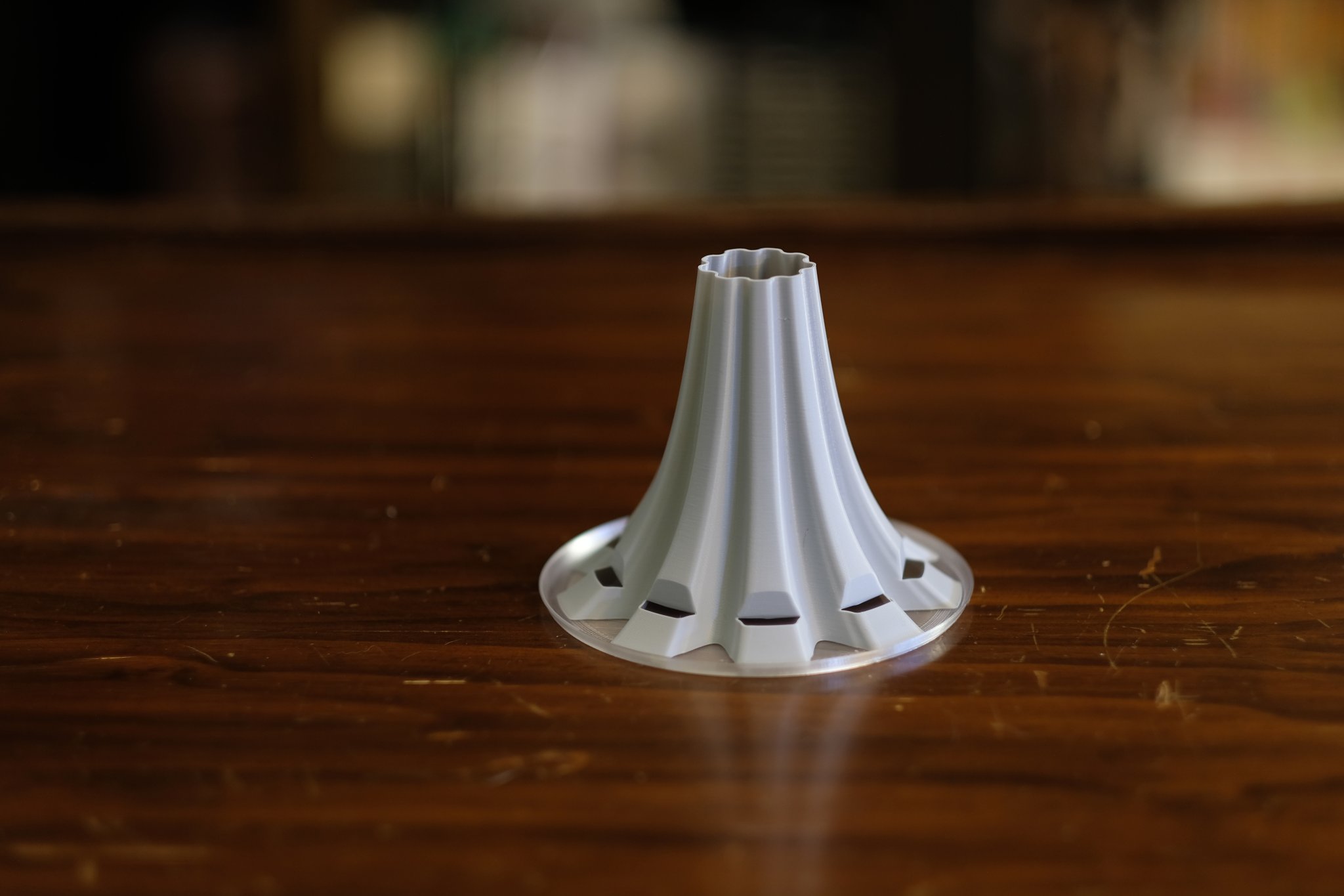 Giá đỡ khô chai, lọ, ly xếp chồng được in chế độ bình hoa