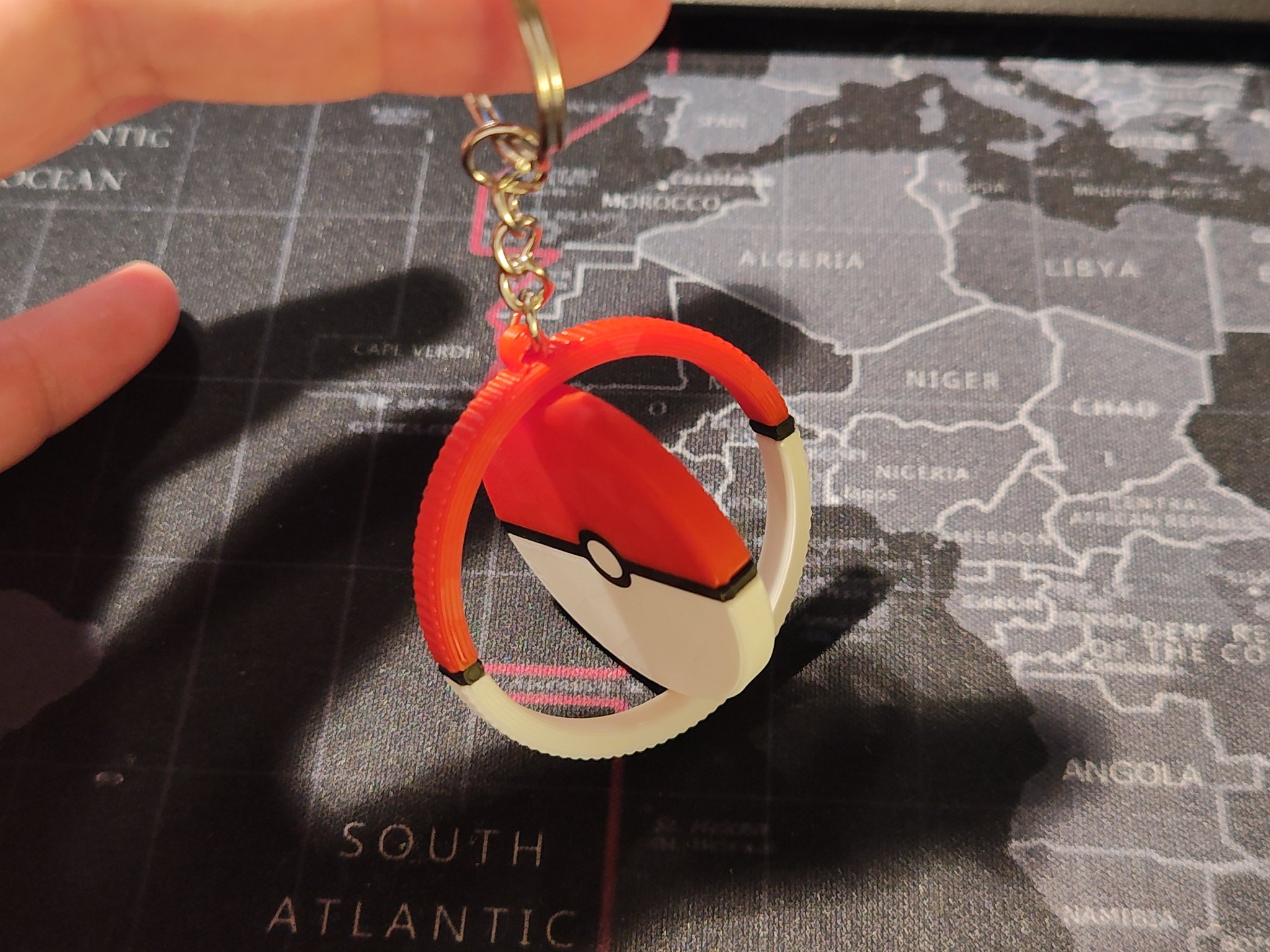 Móc khóa Pokeball xoay nhiều màu sắc in tại chỗ